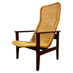 Rare Wicker armchair on solid Wengé frame by Dirk van Sliedregt, 1965.