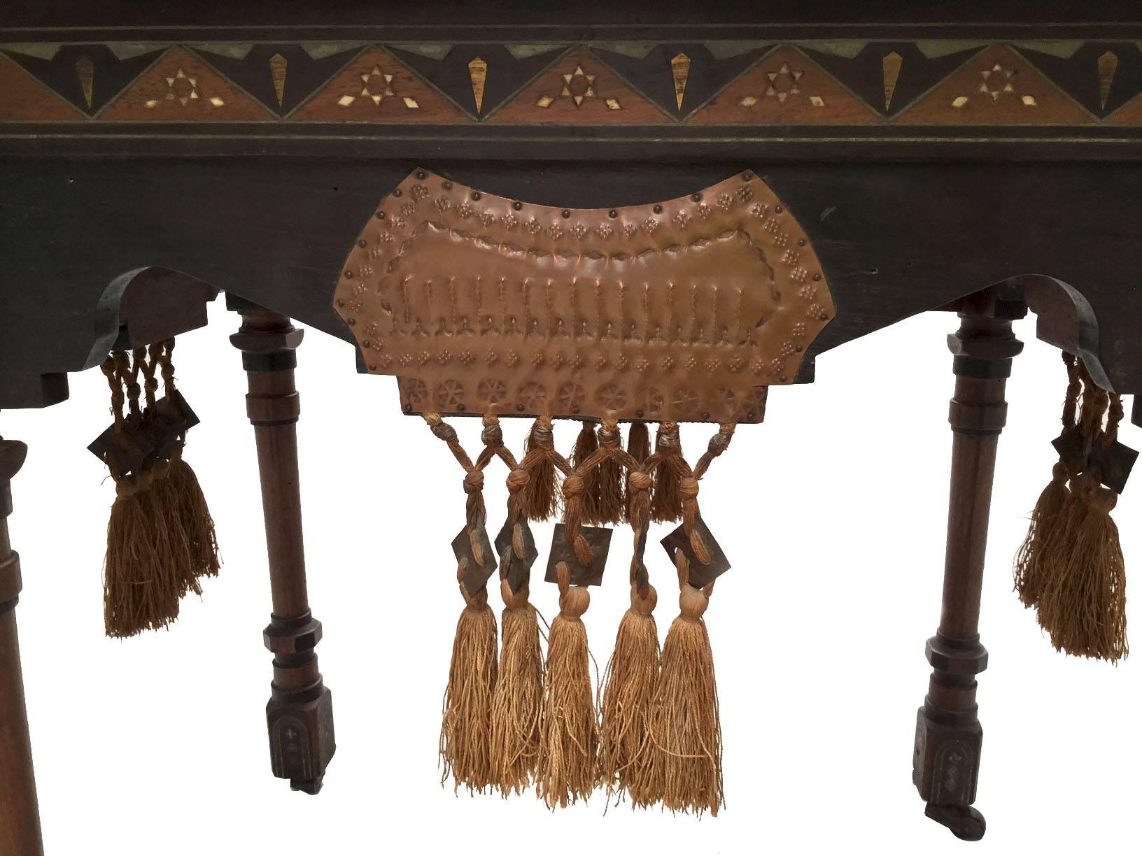 Leather, Indian walnut, copper, ivory, stained black fir tree, trimmings drapes, parchment. These are the exceptional materials used by Carlo Bugatti decorator designer and manufacturer of Art Nouveau furniture, he triumphed at the exhibition of