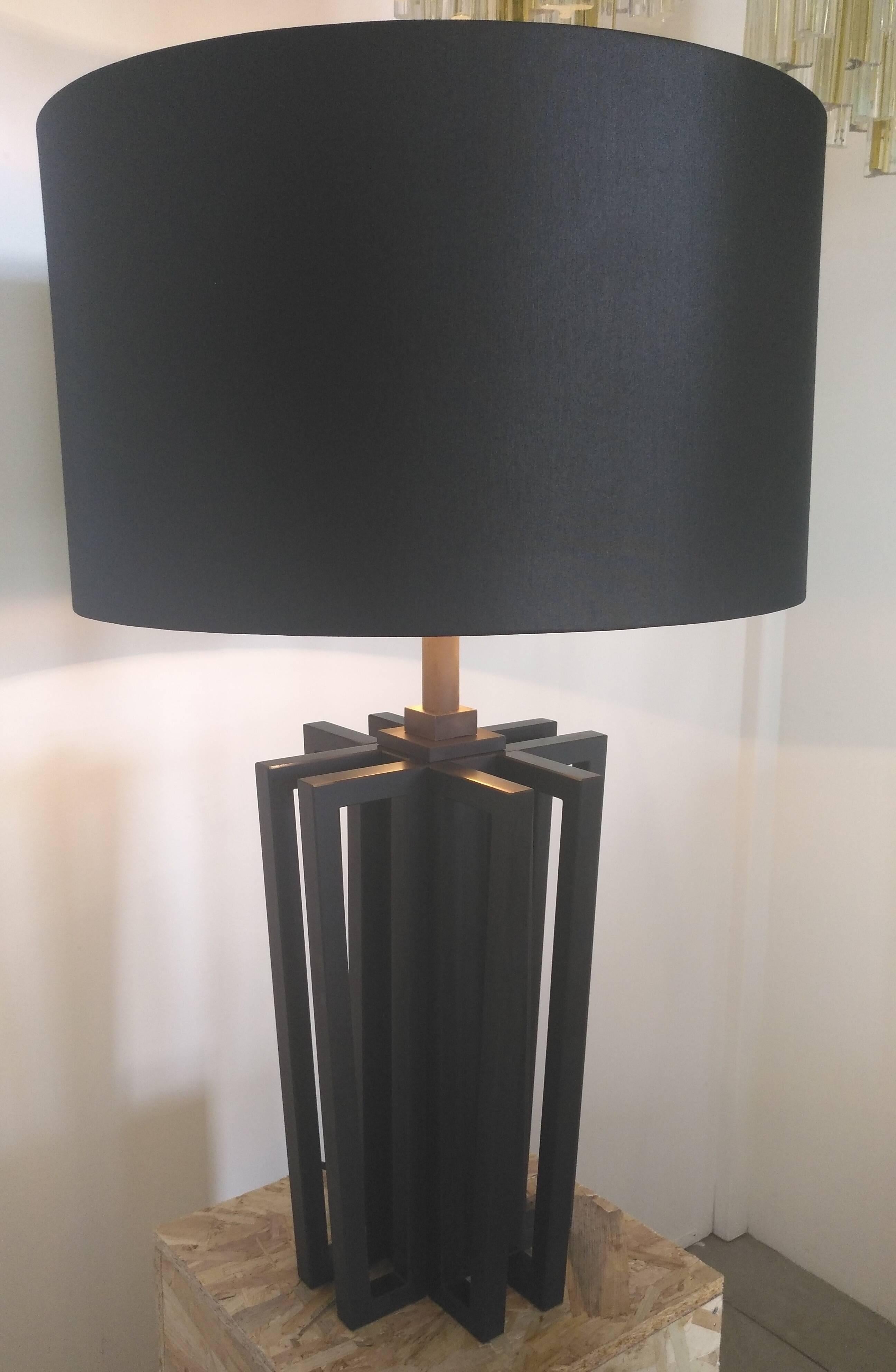 Beautiful table lamps in absolute black marble , with black silk shade gilded inside
This lamp is called 