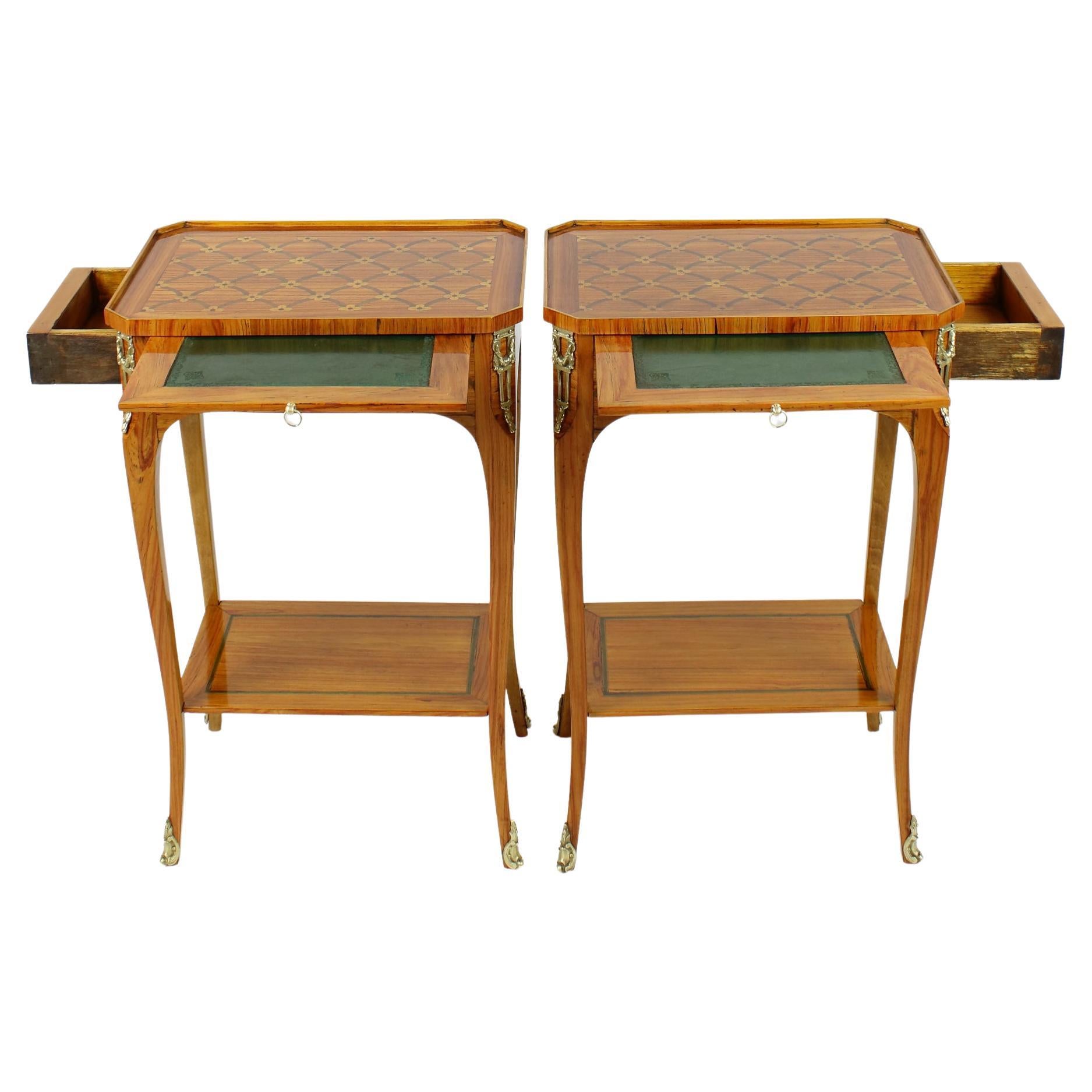 Pair of 19th/20th century Louis XV Marquetry side tables or lady's writing tables

Small Louis XVI style marquetry side tables or lady's writing tables, manufactured in France at the end of 19th/beginning of 20th century; on four cabriole legs