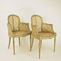Pair of Louis XVI Painted Cane Bergeres