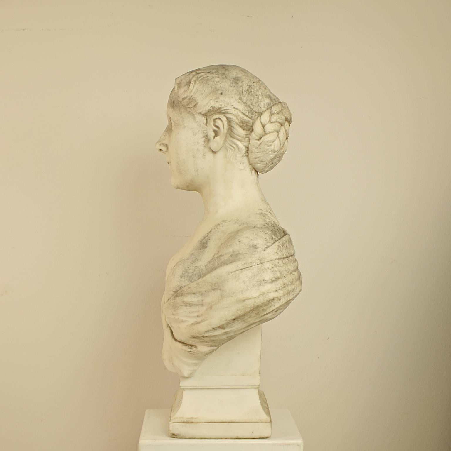Carved 18th or 19th Century White Marble Bust of a Young Woman For Sale