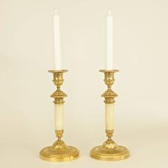A Pair of Louis XVI Ormolu Mounted White Marble Candlesticks, circa 1780