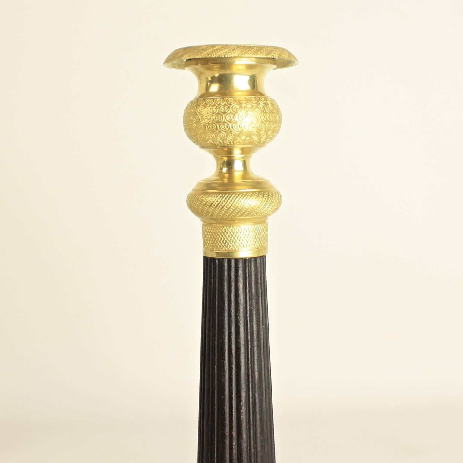 French Pair of Charles X-Patinated and Gilt Bronze Candlesticks