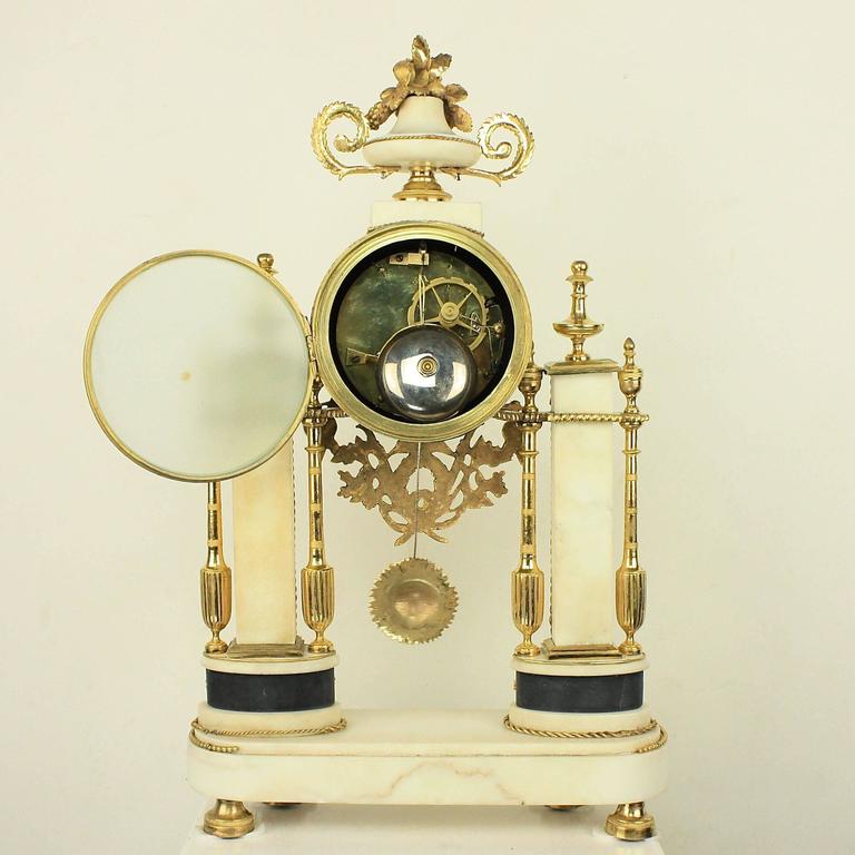 Enamel Late 18th Century Louis XVI Carrara and Black Marble Ormolu Portico Mantle Clock For Sale