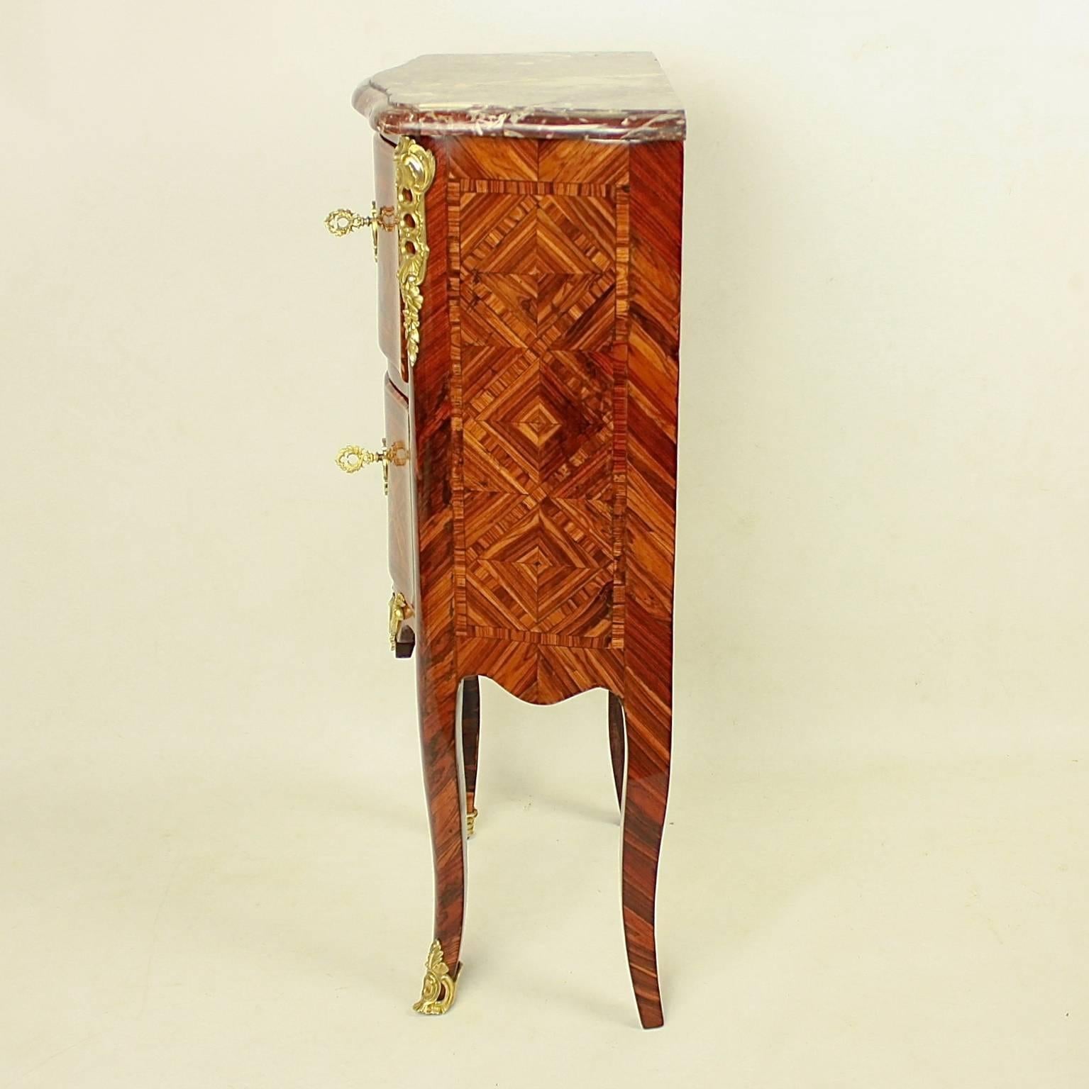 Gilt Small Tulipwood and Parquetry Commode, Late Regence, in the Manner of M. Criaerd