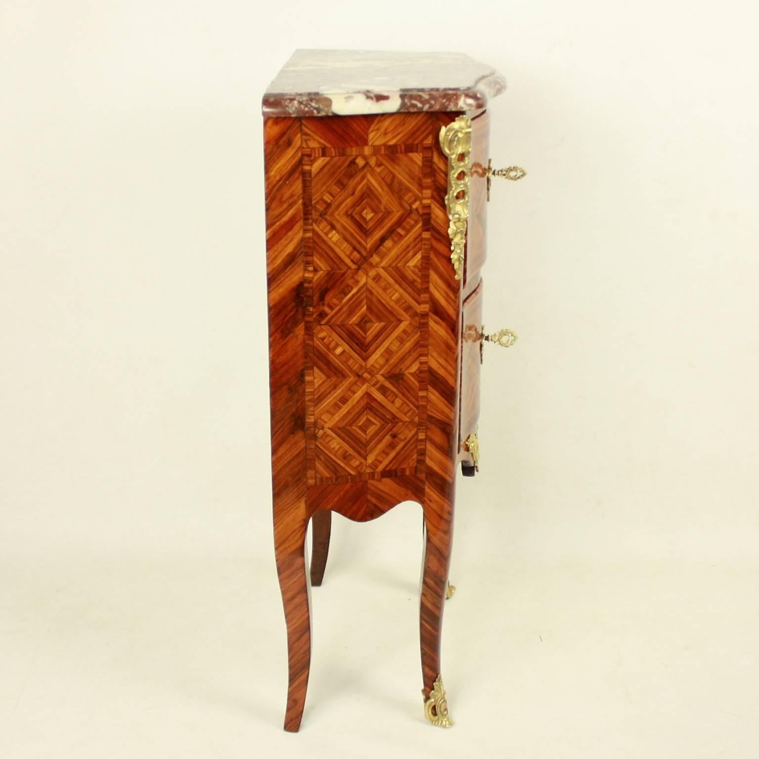 Early 18th Century Small Tulipwood and Parquetry Commode, Late Regence, in the Manner of M. Criaerd