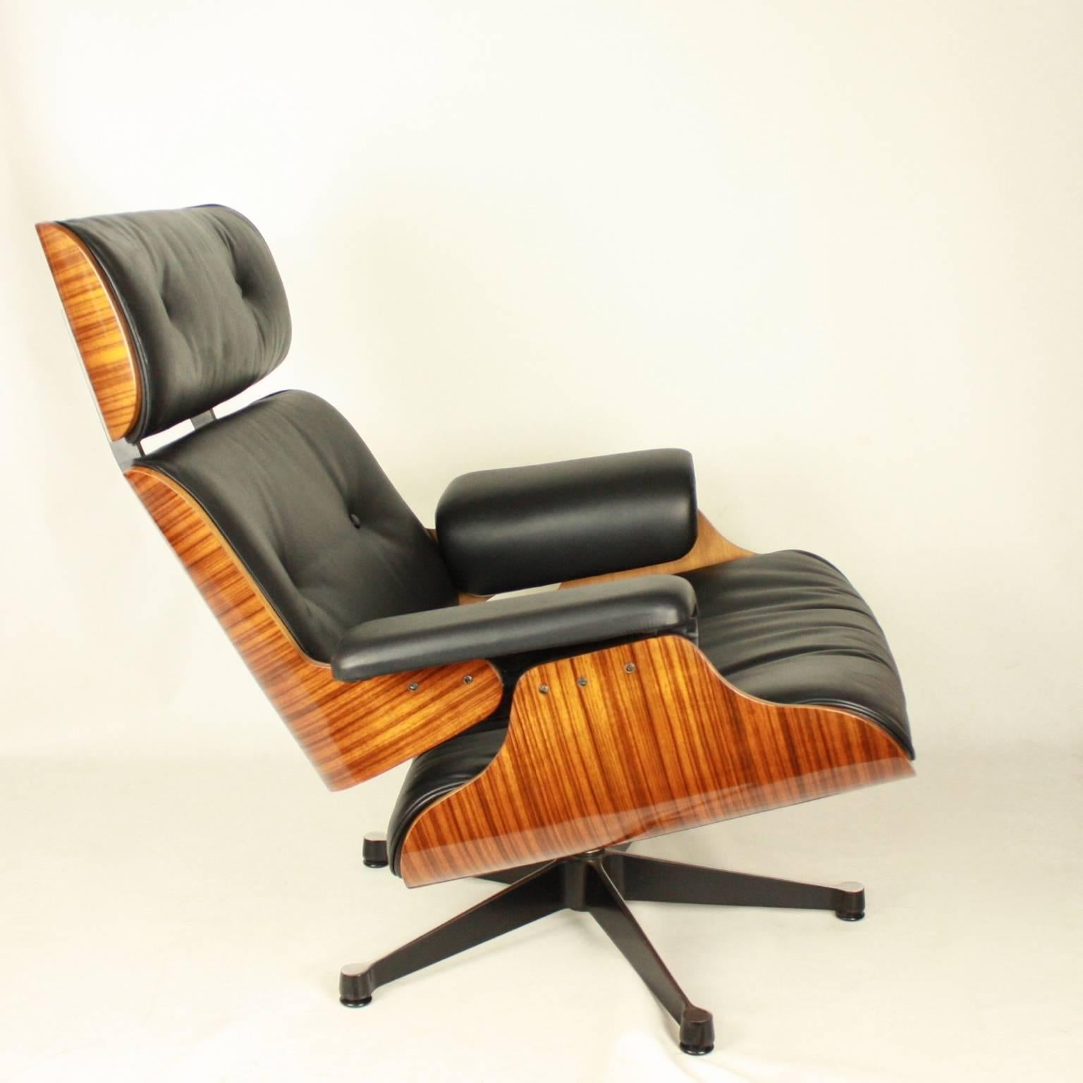 American Pair of Ray and Charles Eames Style Lounge Chair with One Ottoman
