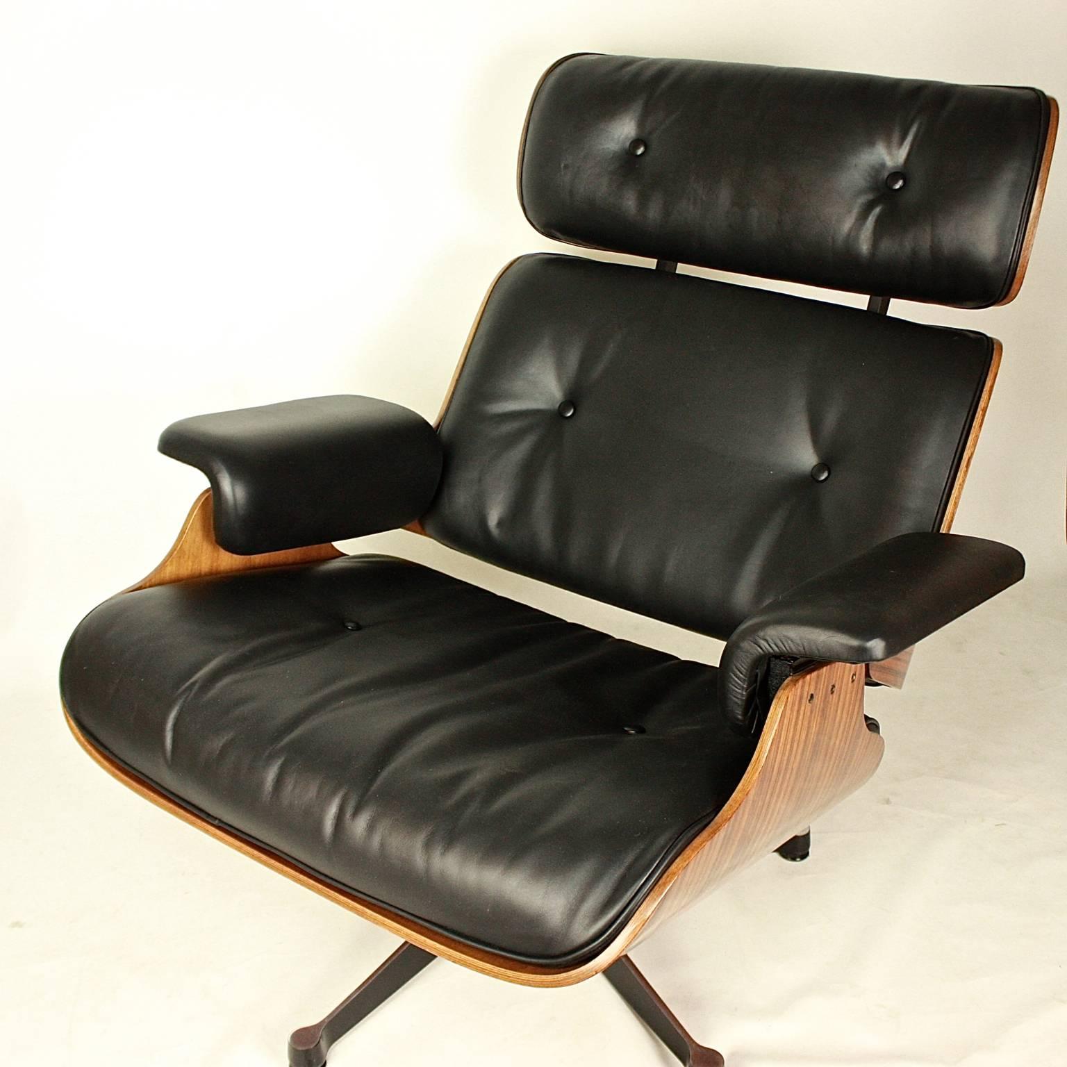 Leather Pair of Ray and Charles Eames Style Lounge Chair with One Ottoman