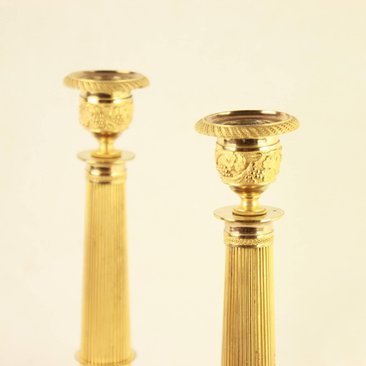 Pair of French Empire Ormolu Candlesticks In Excellent Condition In Berlin, DE