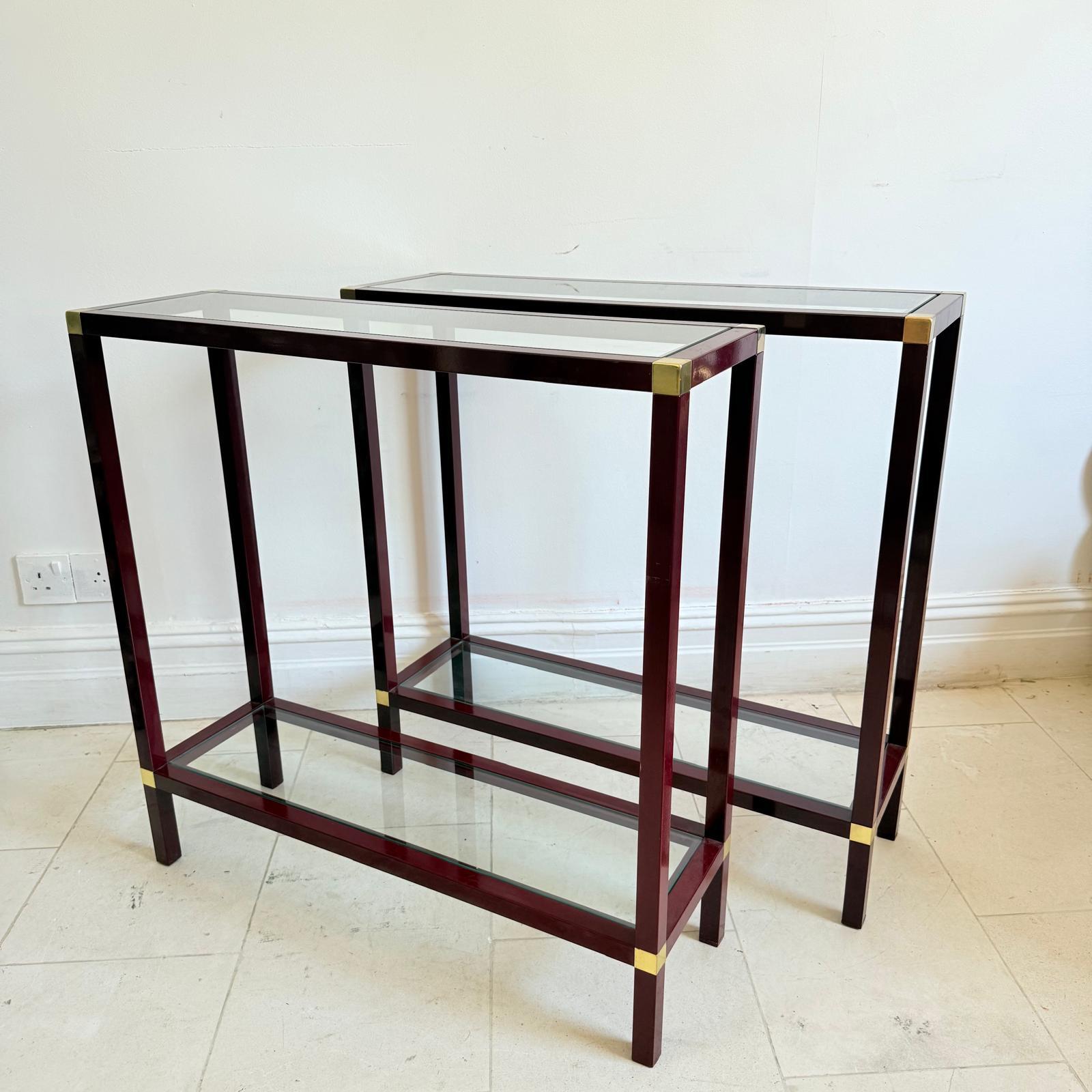 This pair of console-tables created by Romeo Rega elegant and simple design, shelve and top in glass, structure and a feet in red lacquer with shelving corners in polished brass. Italian c.1960's