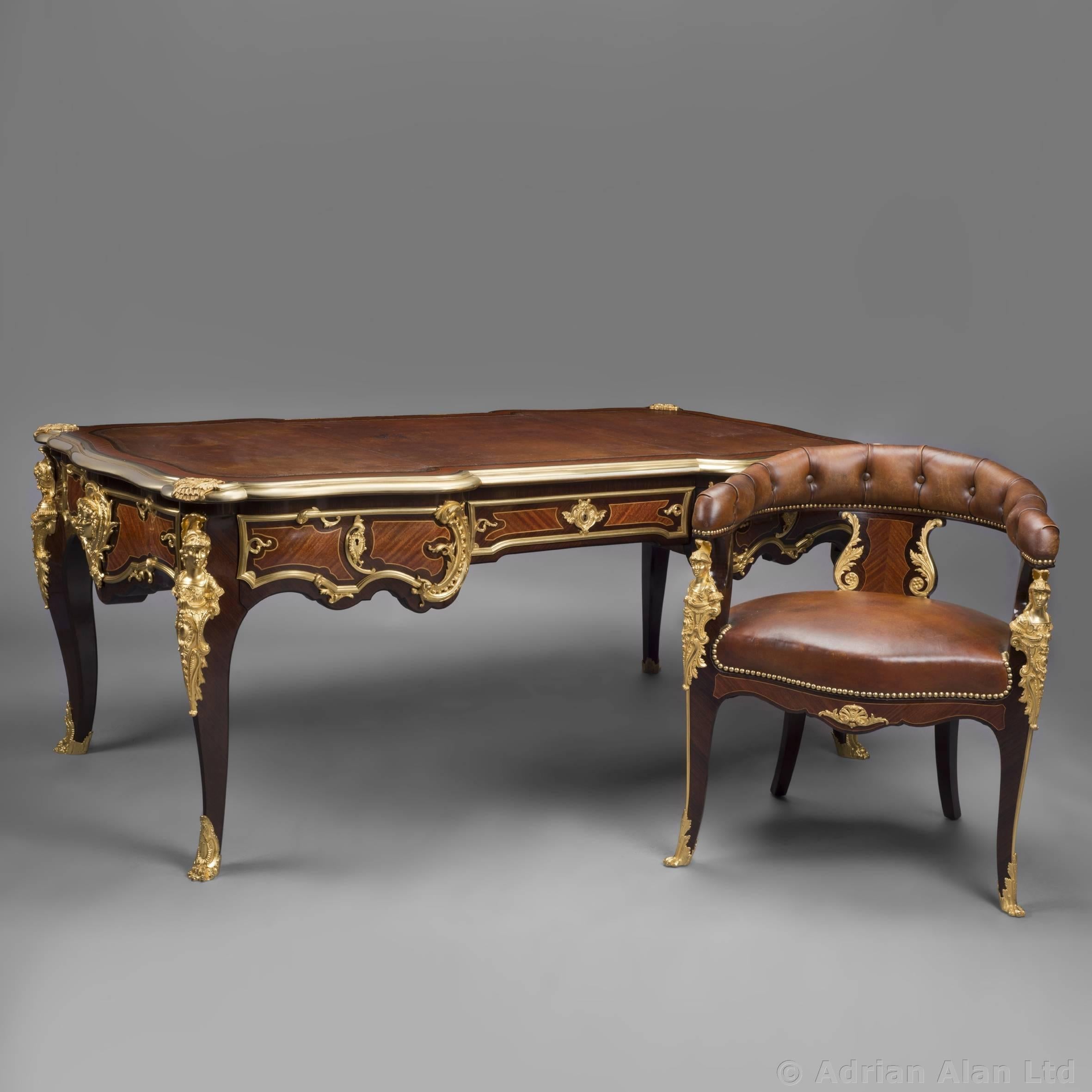 ‘Bureau Plat à Têtes De Guerriers Antiques‘, an important Regence style gilt bronze-mounted kingwood and tulipwood Bureau plat after the model by Charles Cressent, by Repute from the collection of Emil Glückstadt, Denmark’s ‘Napoleon of