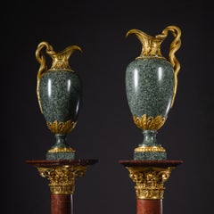 A Pair of Louis XVI Style Green Granite Ewers by Henry Dasson