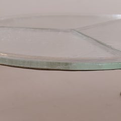 round forged bronze glass coffee table by Lothar Klute