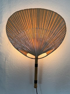 Lámparas Uchiwa de Ingo Maurer: apliques de pared