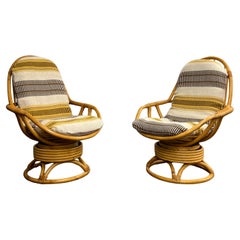 Used Pair of Bamboo and Rattan Swivel Lounge Chairs with Woven Cushions