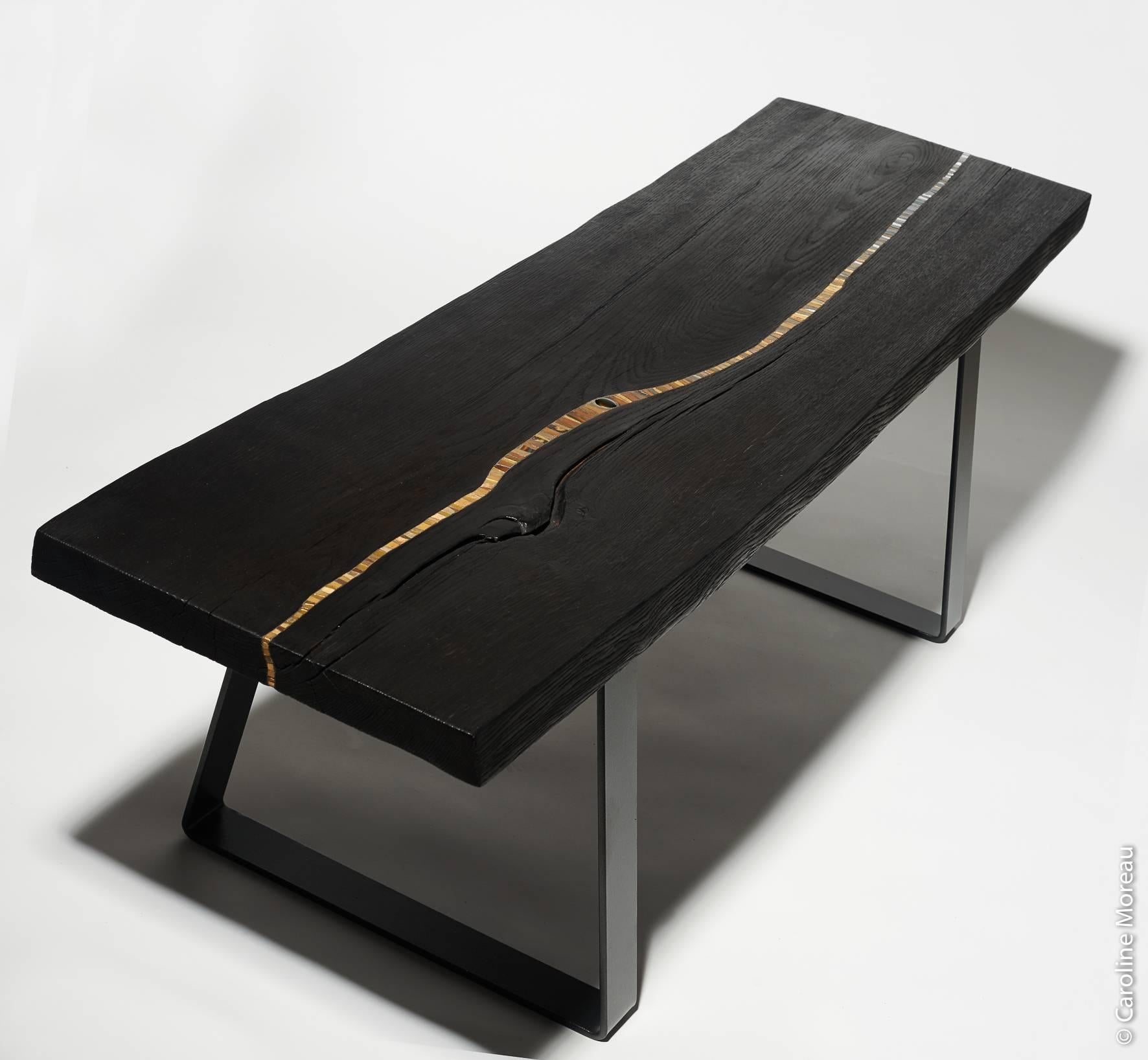 Burned oak with inlaid molten glass, ceramic and stone shade of silver and golden color.
Black metal feet.

Measure: Height 40 cm 
Large 126 x 35 cm.

Each piece is unique, hand realized.
Creation 2015 by French artist Suzanne