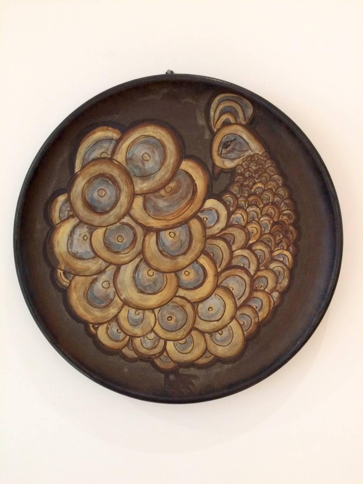 Nice stylised golden / brown peacock ceramic decorative dish.
Signed Kostanda / Vallauris.