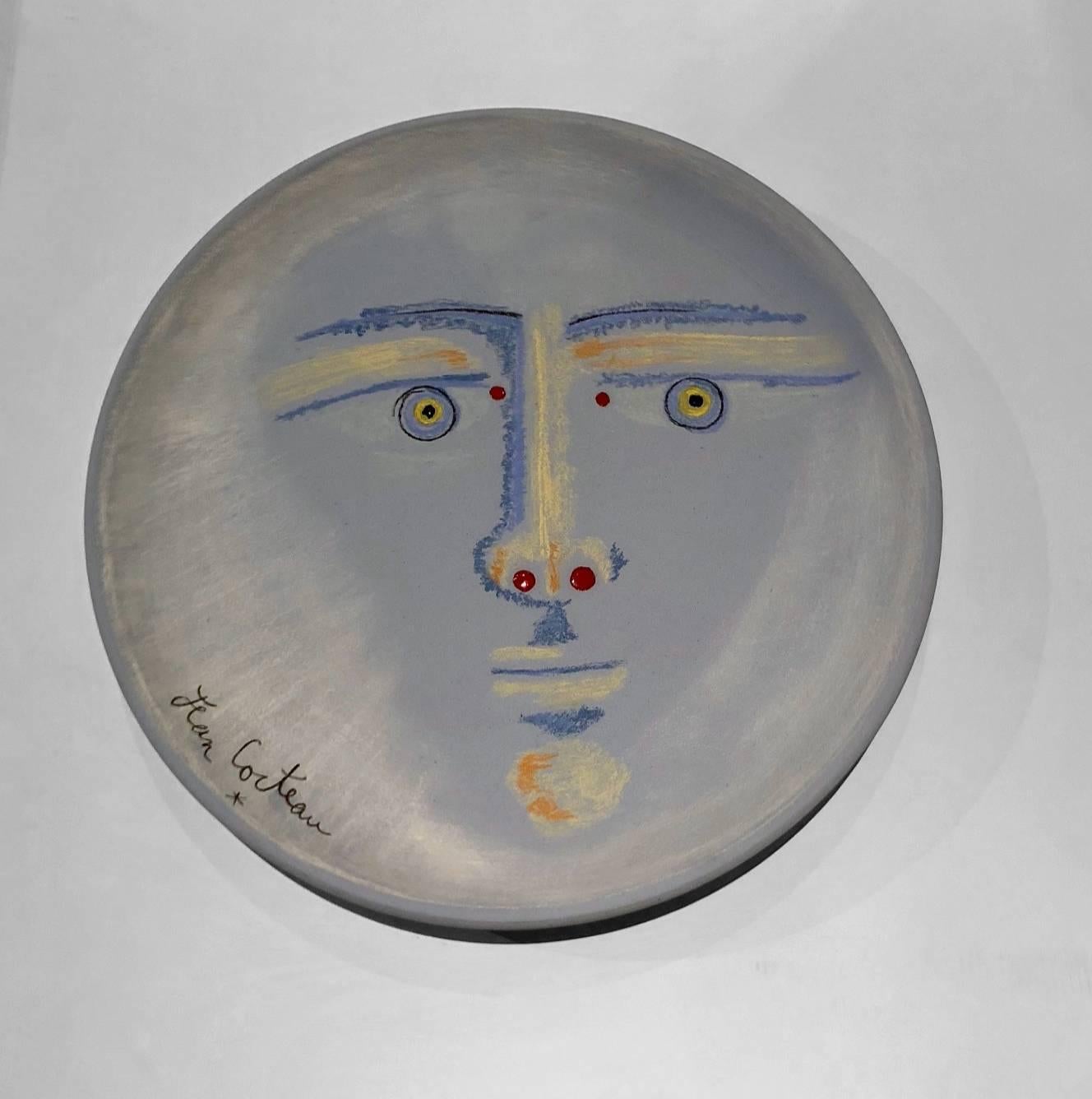 Jean Cocteau ceramic dish clair de lune, 1958

Edition originale madeline and jolly with certificat d'origine, 1958.

Blue earthenware with shiny enamel eyes and nose

N° 15/25 exemplaires.

Jean Cocteau poteries by Annie Guedras p 128.