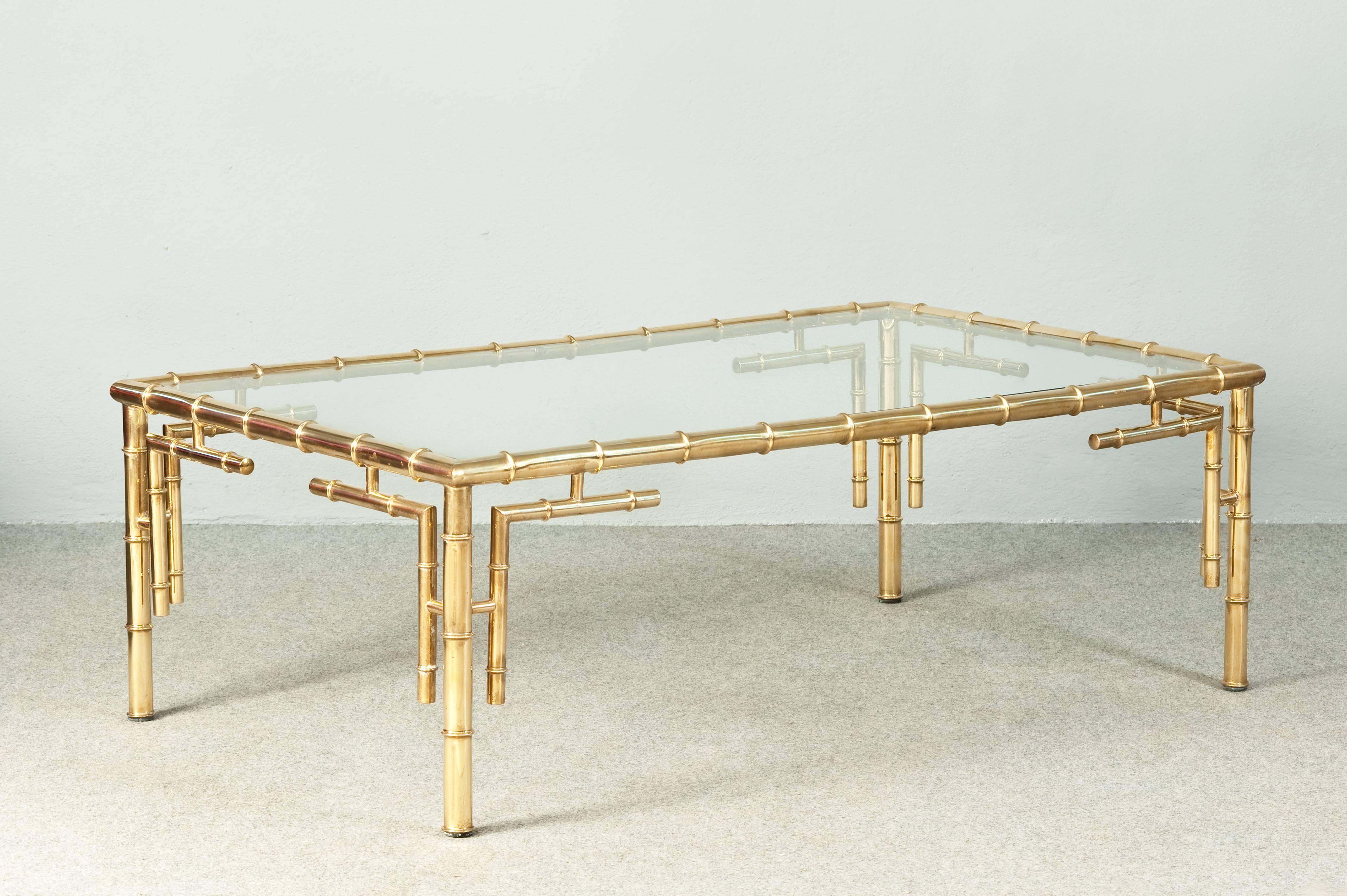 Elegant brass faux bamboo coffee table. Maison Jansen style.
