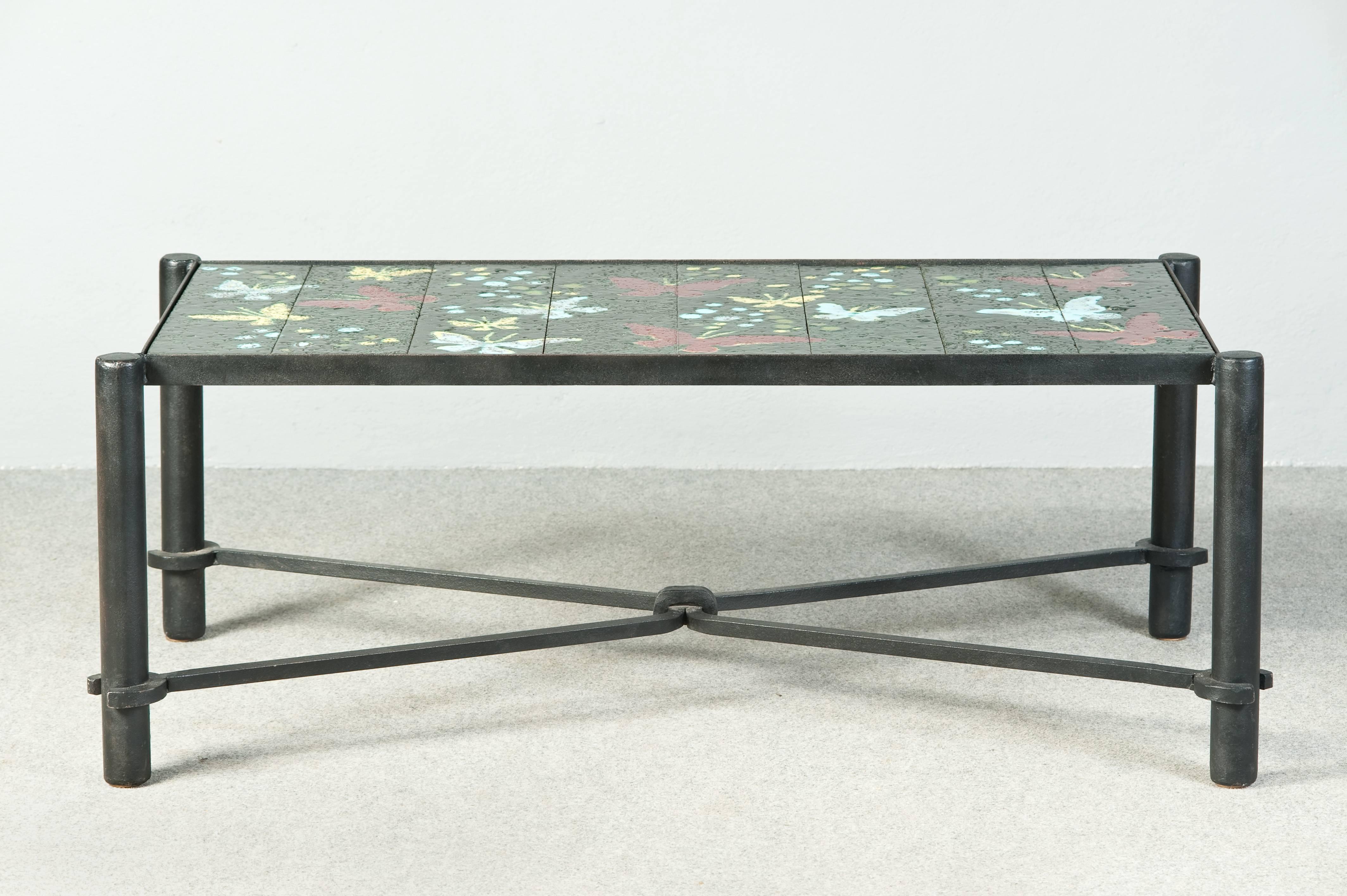 Famous glazed lava stones butterflies coffee table. iron base. Published in Jacques Adnet by Alain-Renè Hardy, Gaelle Millet.