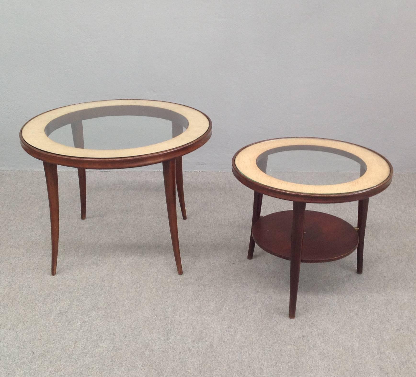 Stunning set of two wood, parchment and glass round side tables.
The little one has two tiers, wood and glass and parchment.
Measures's little table: Diameter- 53 cm height- 48 cm.