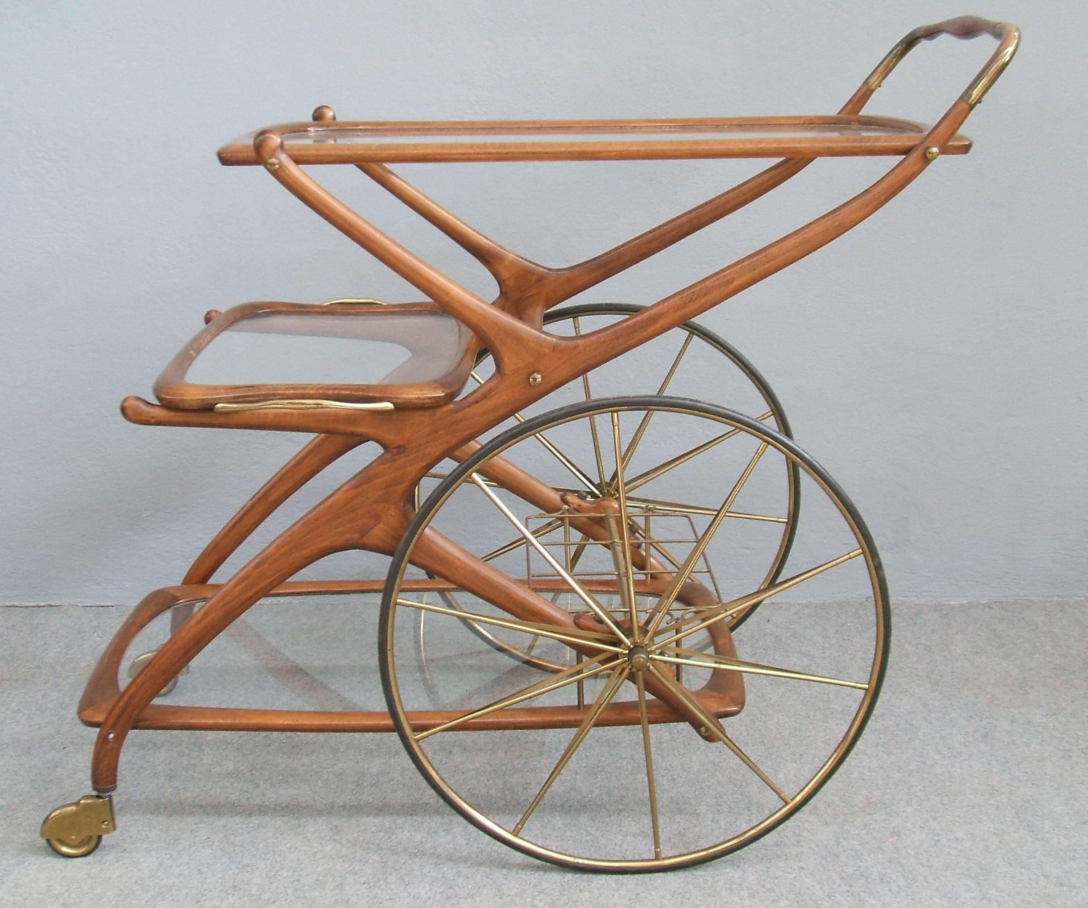 Elegant shape, two glass tiers, little original tray, brass details and brass bottle holders.