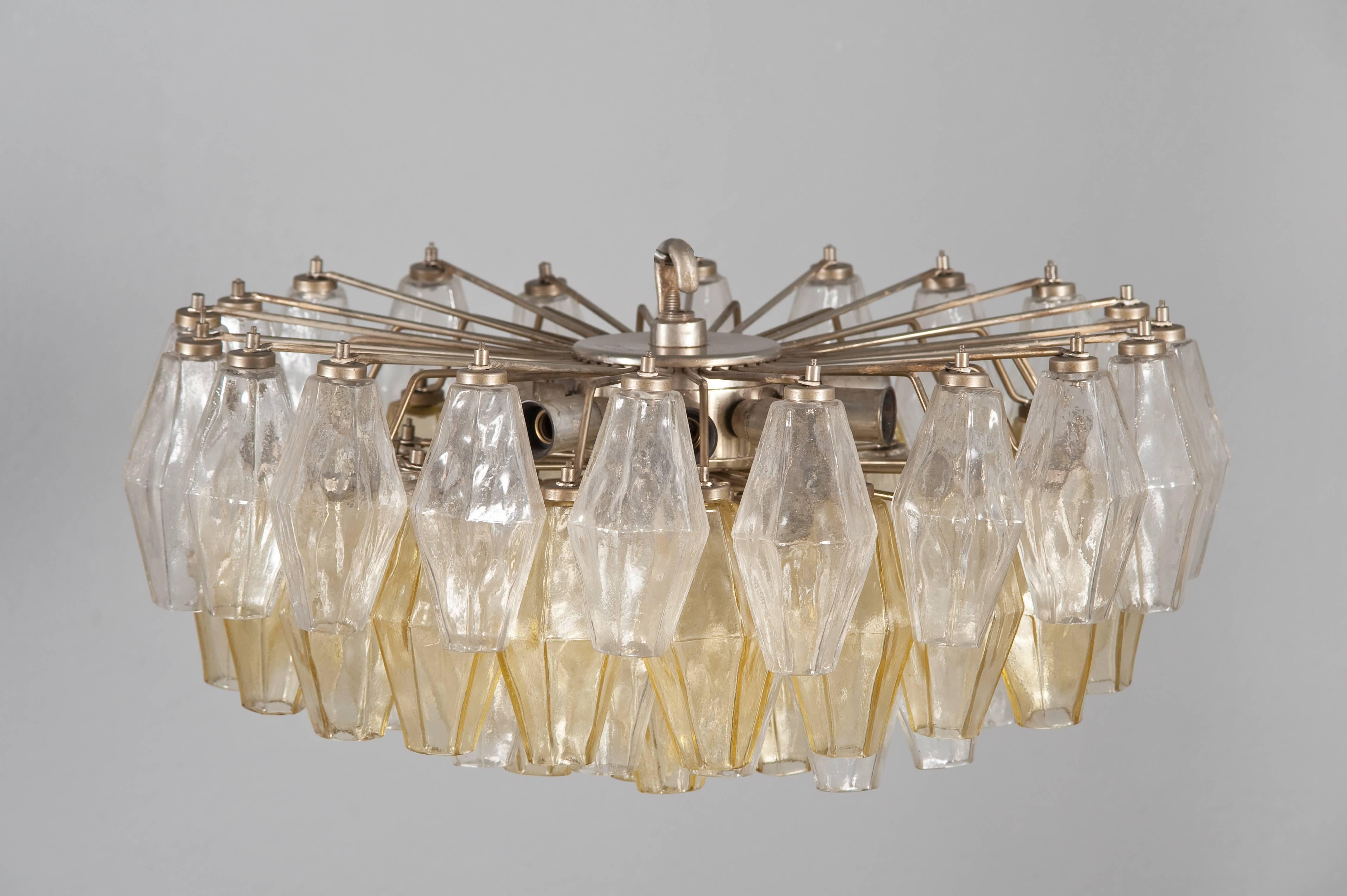 Murano chandelier designed by Carlo Scarpa, 1958-1960 for Venini, yellow and clear transparent glass, nine-light sockets. Signed Venini.