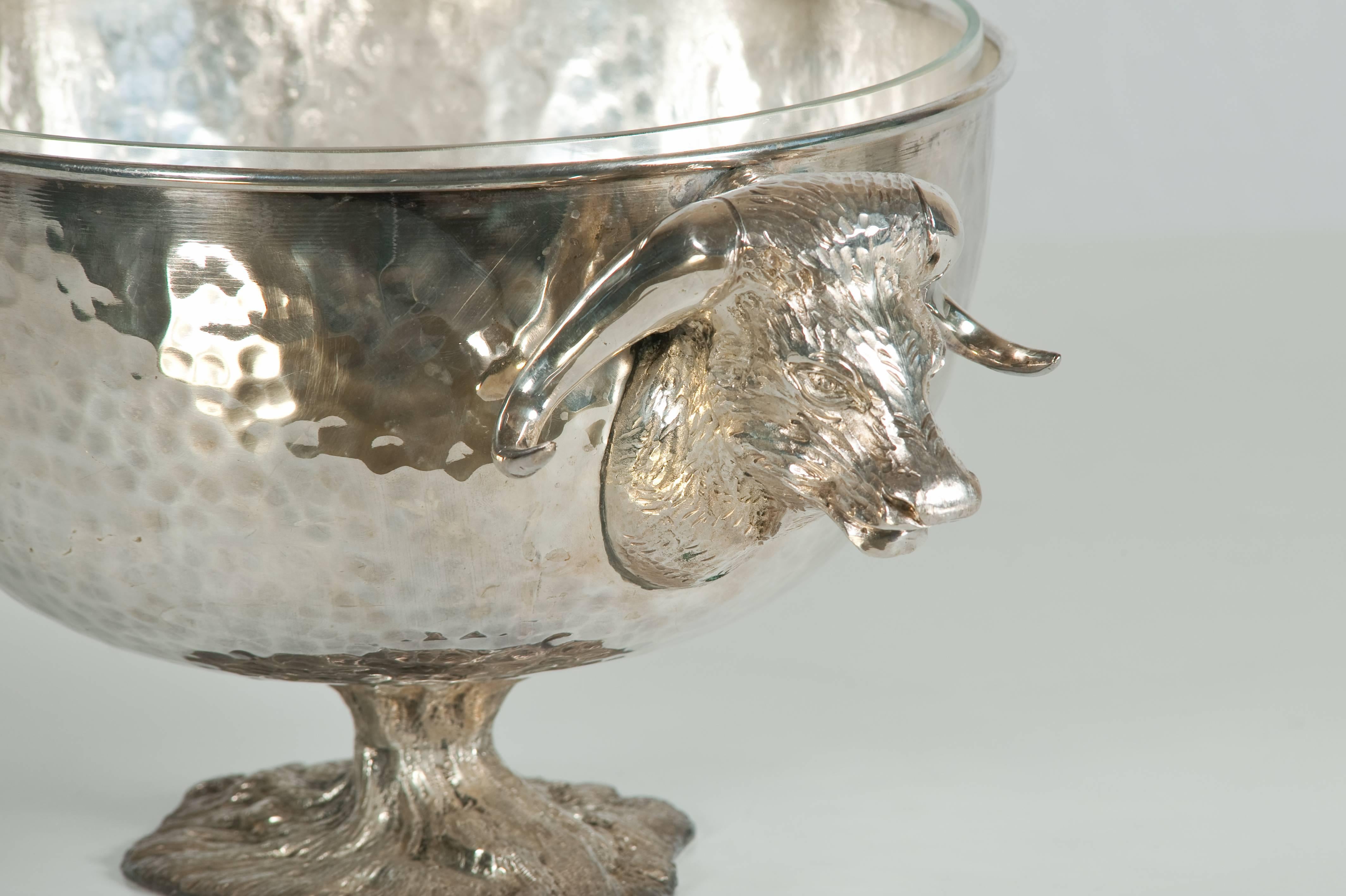 Silver plated centerpiece with buffalos.
Signed Gabriella Crespi.