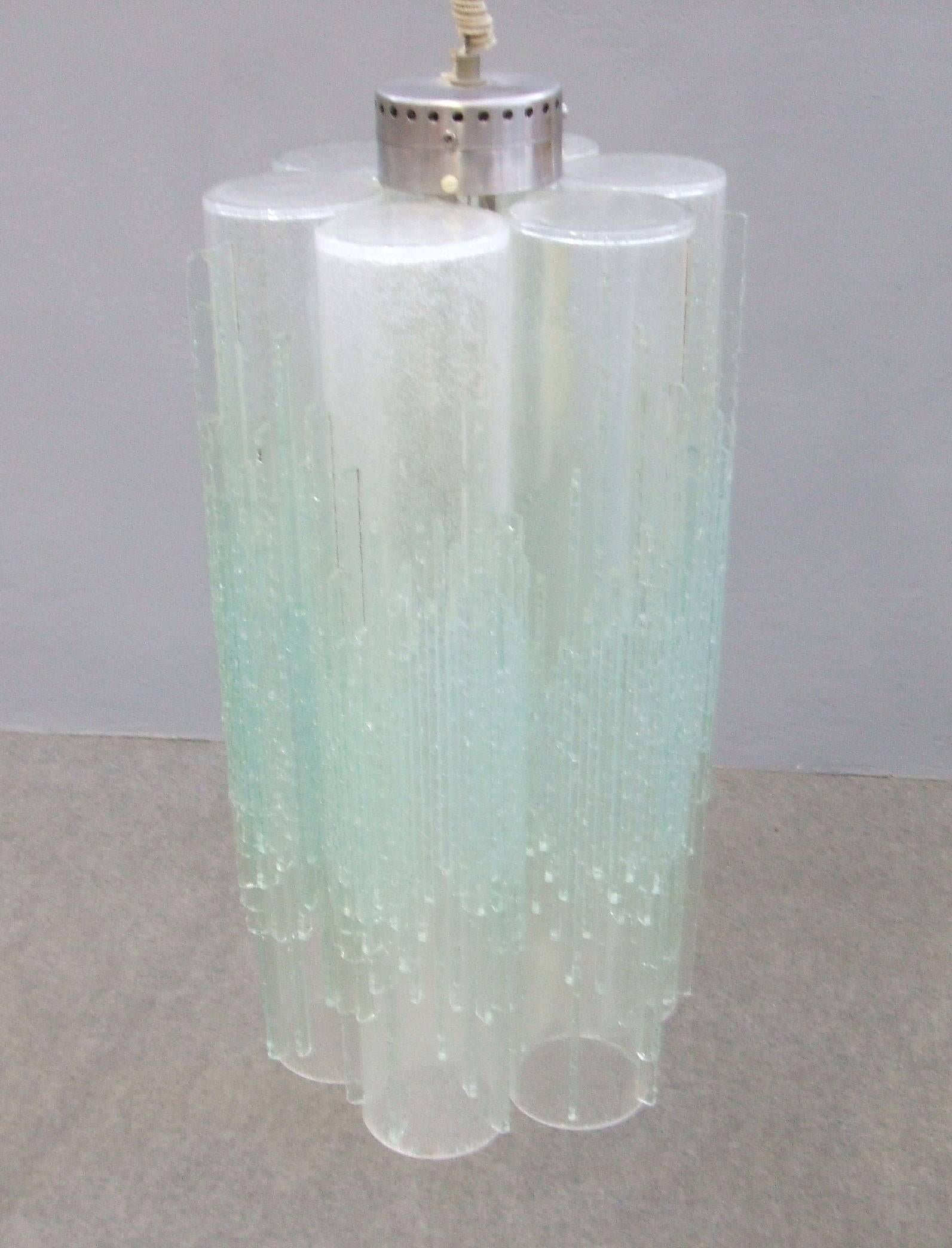 Stunning pendant by Poliarte. Murano glass decorated with glass icicles.
Each one is slightly clear blue and green tint.