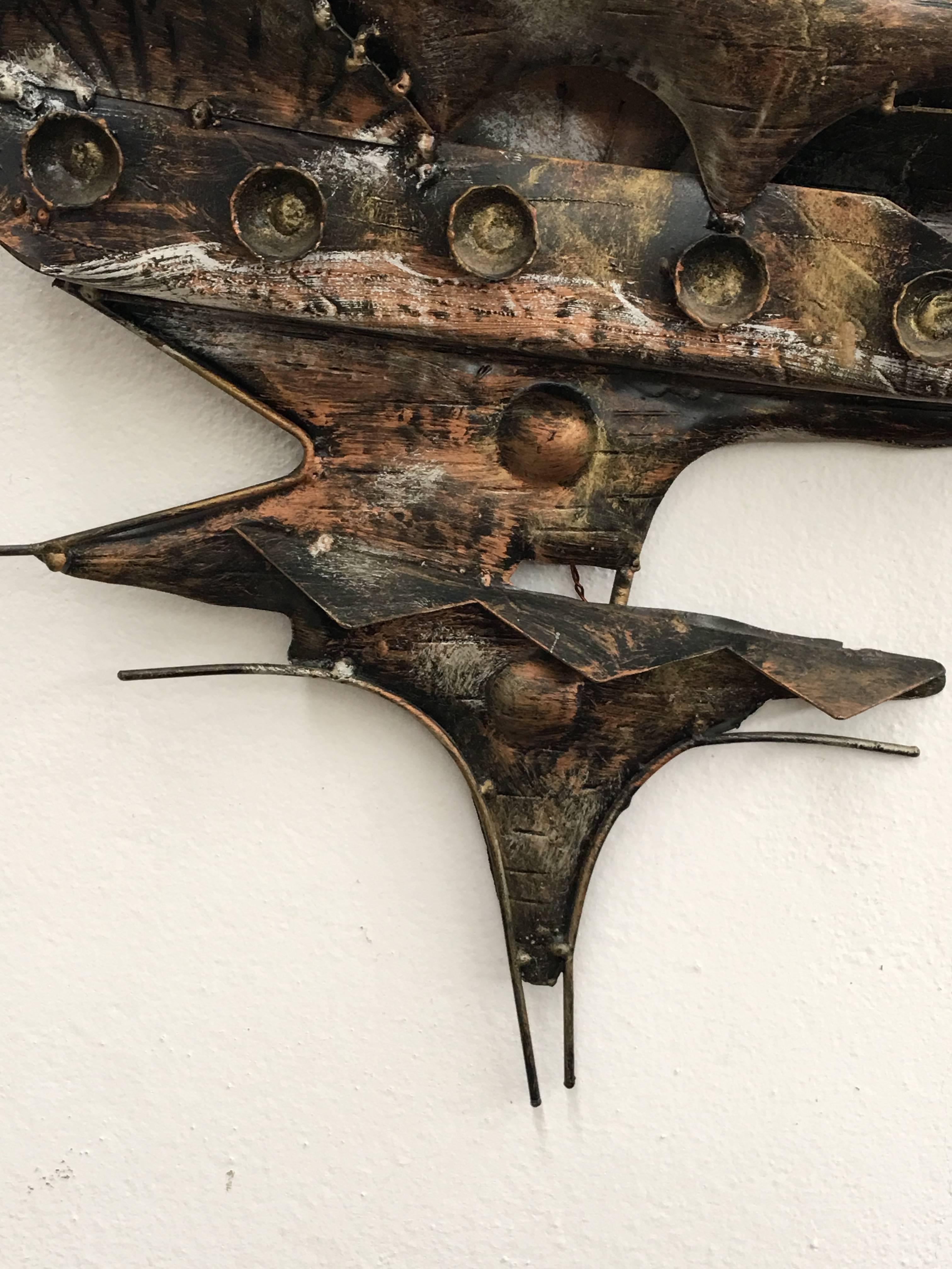 Stunning iron boat wall sculpture in the style of Curtis Jere.