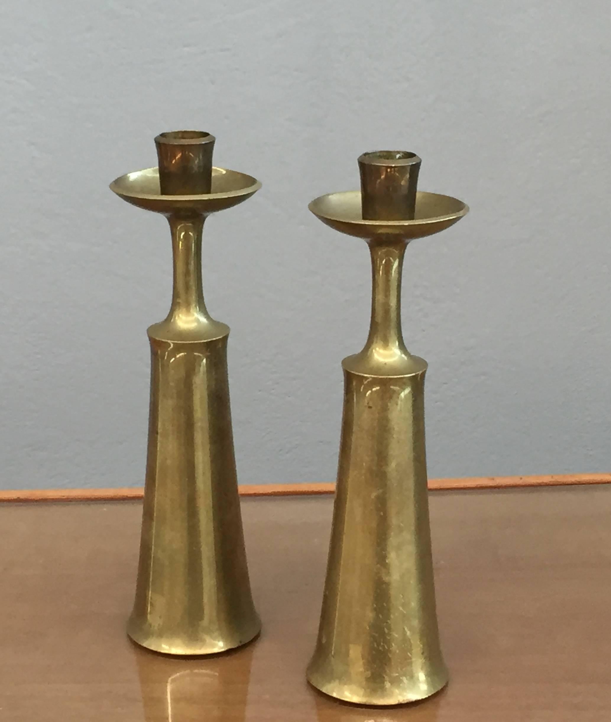 Stunning pair of brass candlestick signed Jens Quistgaard for Dansk.