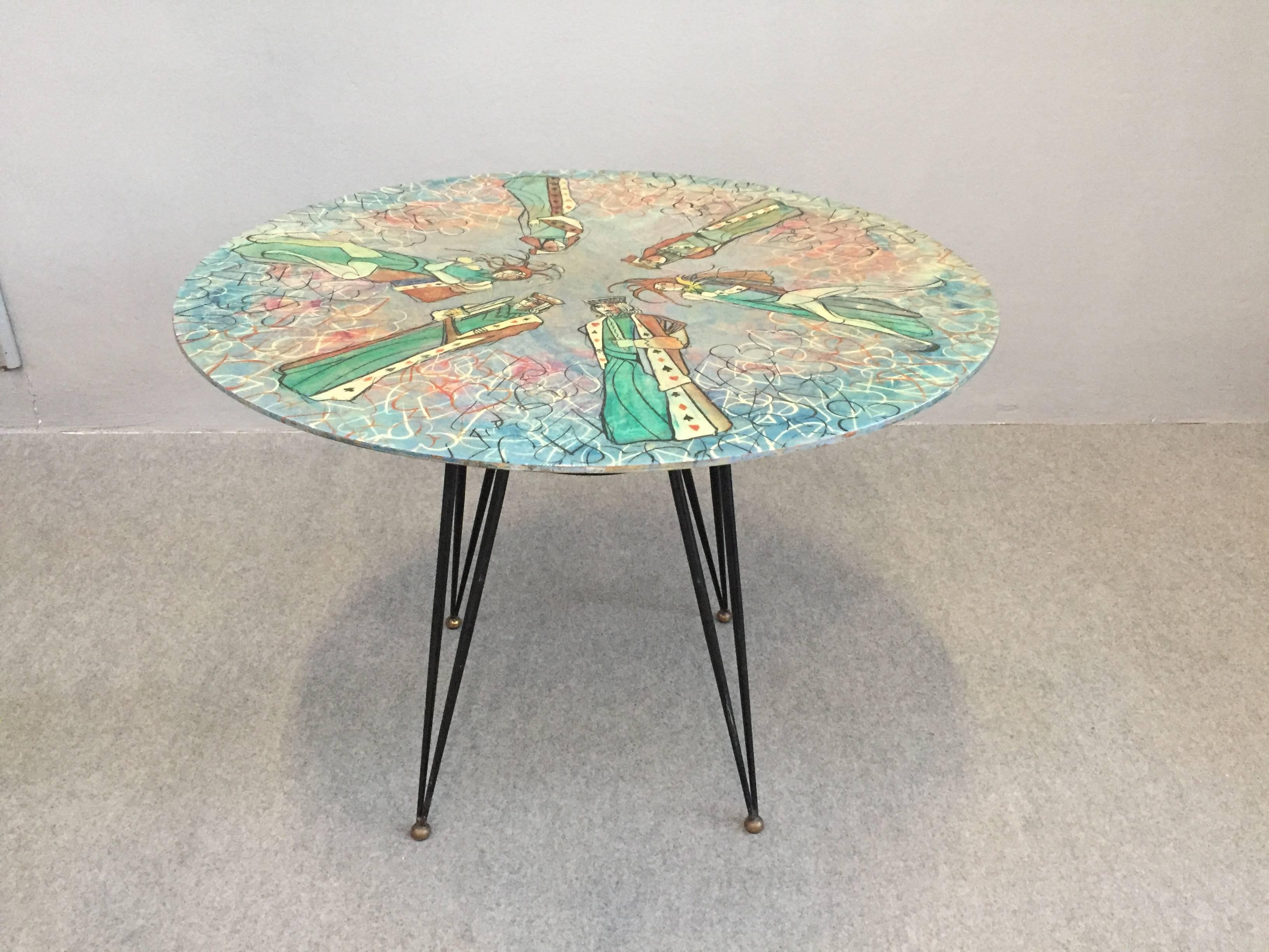 Very nice and rare table by Decalage, Torino, Italy.
Painted top with wonderful cards figures.
Label under the top.