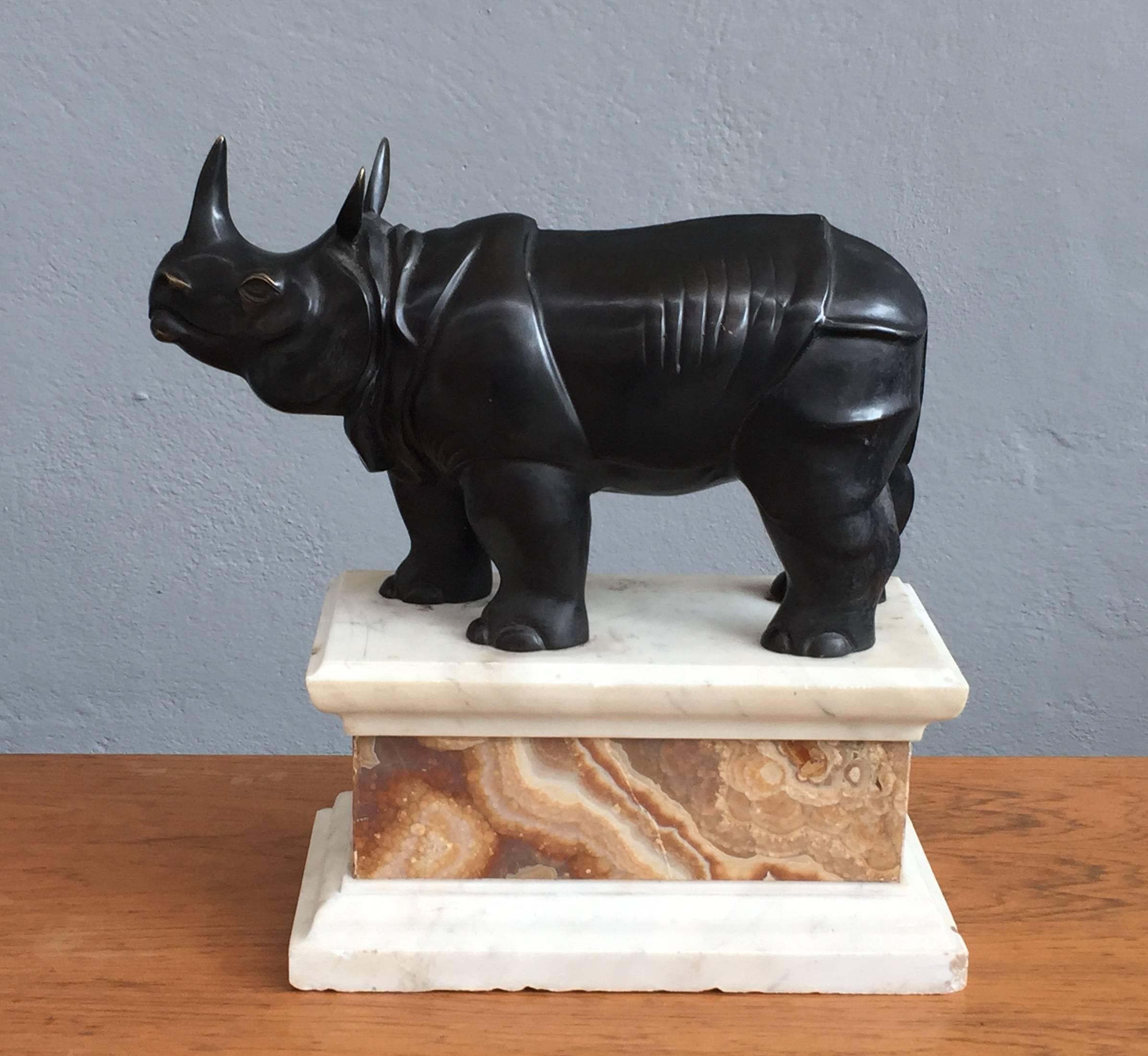 Marble base for this bronze rhino.
Very charming and collectable solid bronze rhino.
Excellent bronze casting.