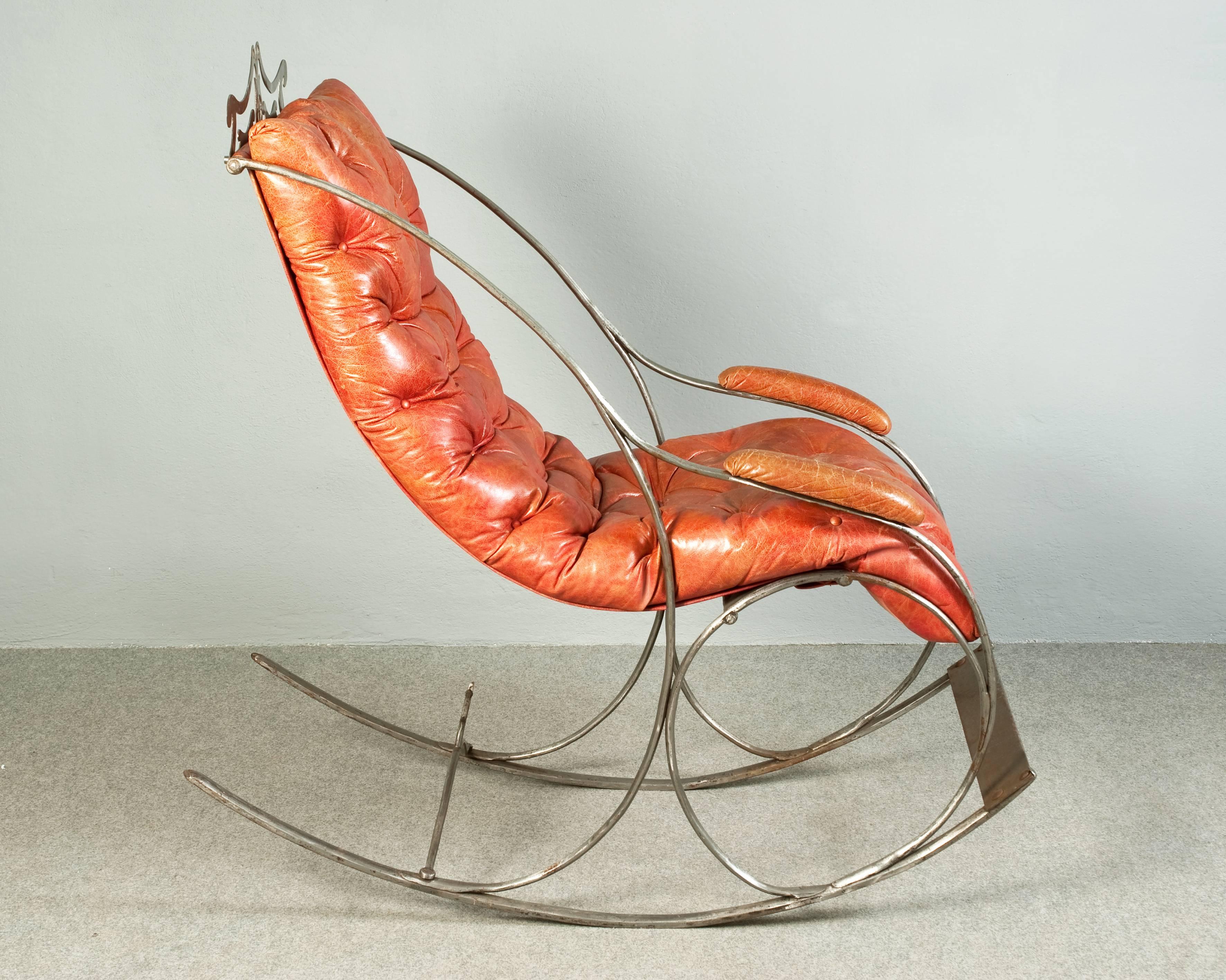 Iron rocking chair with leather.