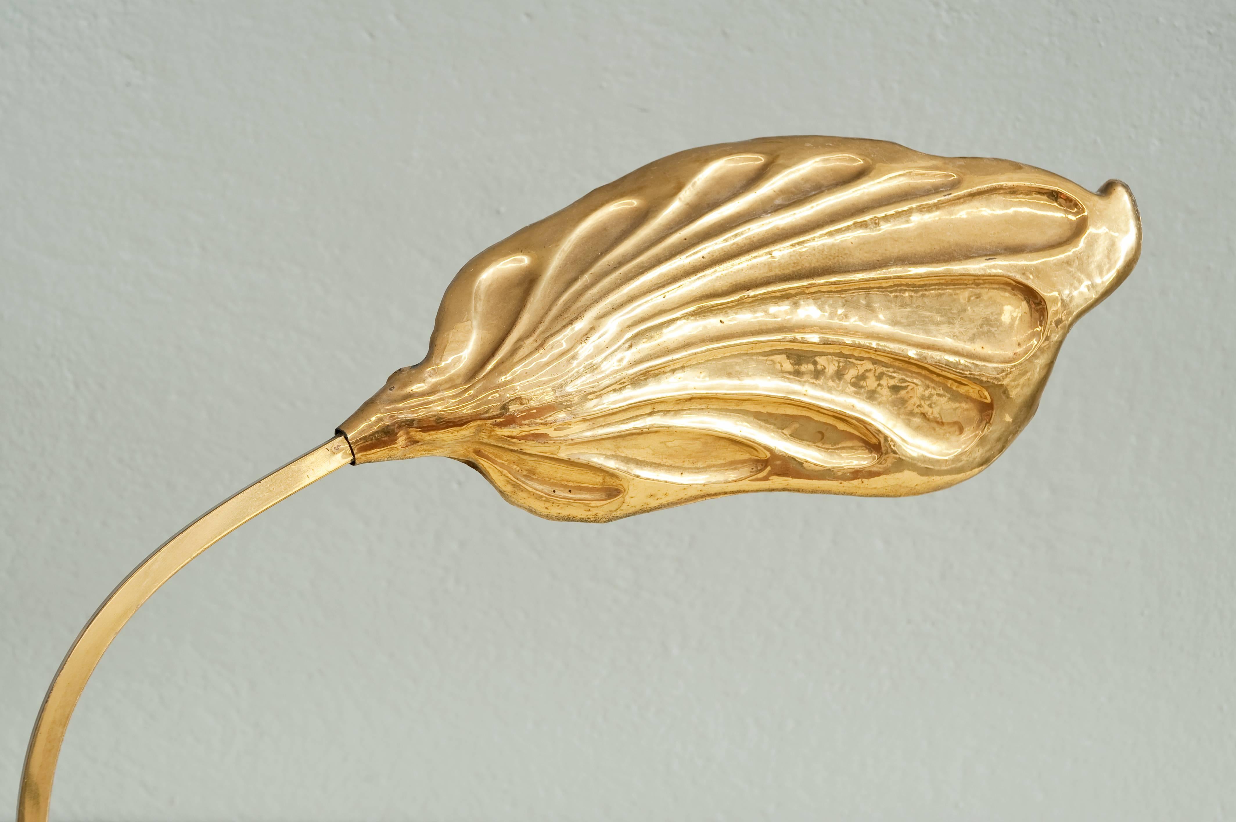 Extraordinary pair of brass rhubarb leaf table lamp designed by Tommaso Barbi.