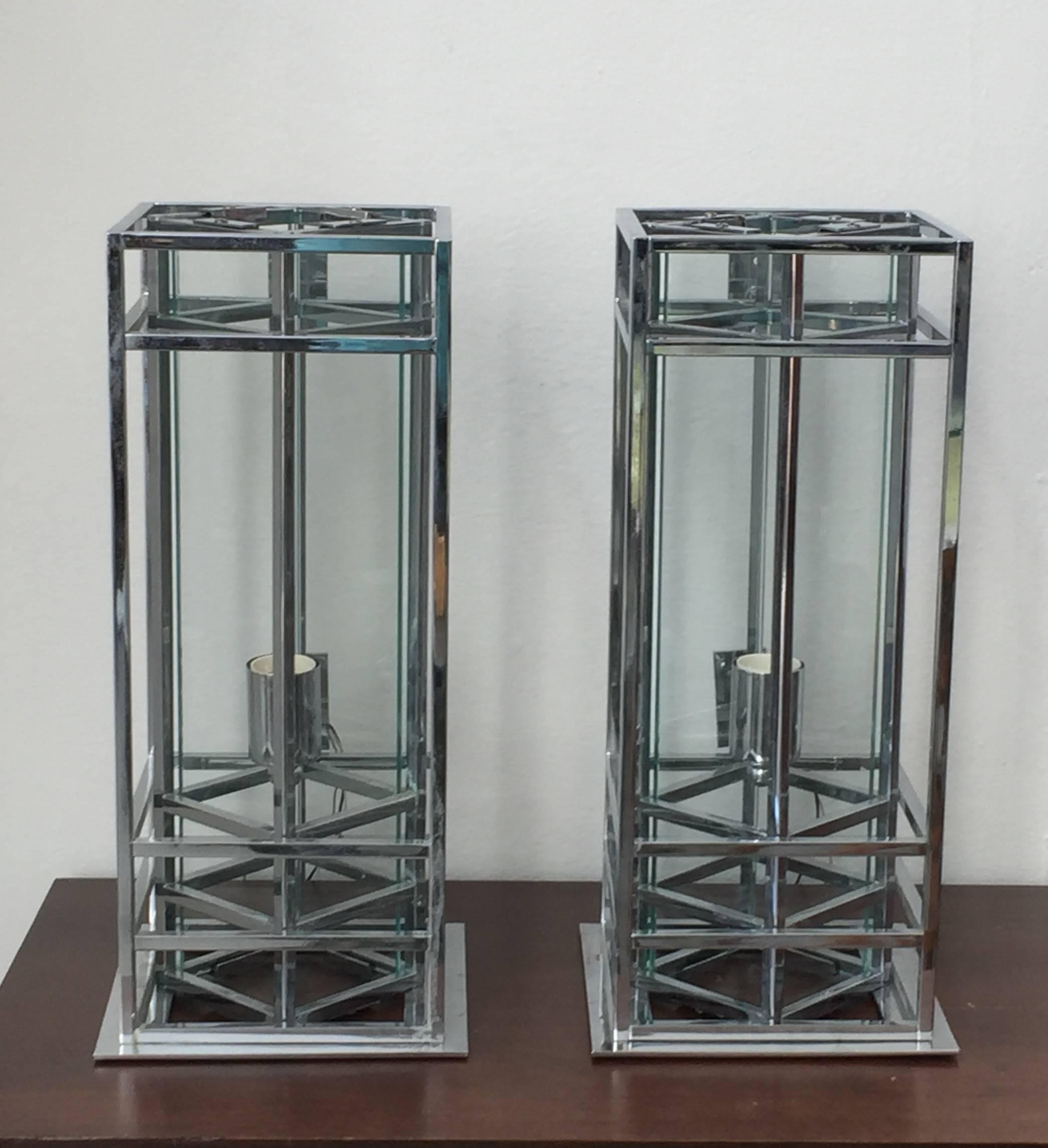 Huge pair of chromed and glass wall lights.
Sciolari label.