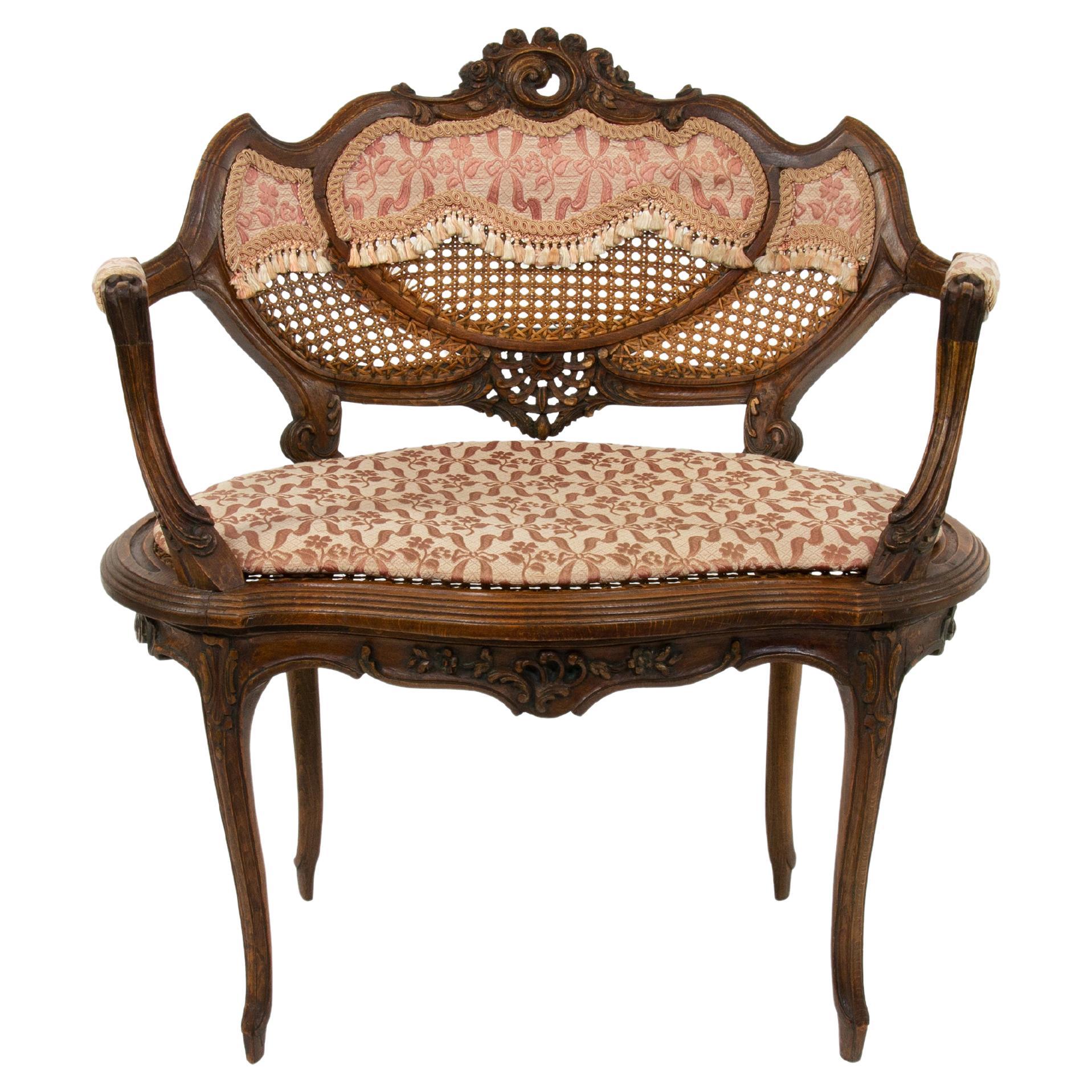 This exquisitely crafted 19th-century French Louis-Philippe armchair is a captivating example of mid-19th-century neo-Rococo style, also known as Louis-Philippe style in France. It draws inspiration from the opulent court furniture of the period,