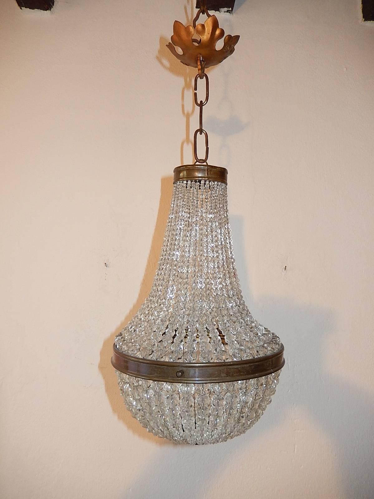 Housing one light, rewired and ready to hang. Crystal beads with crystal finial on bottom. Adding another 8 inches of original chain and canopy. Free priority shipping from Italy.
