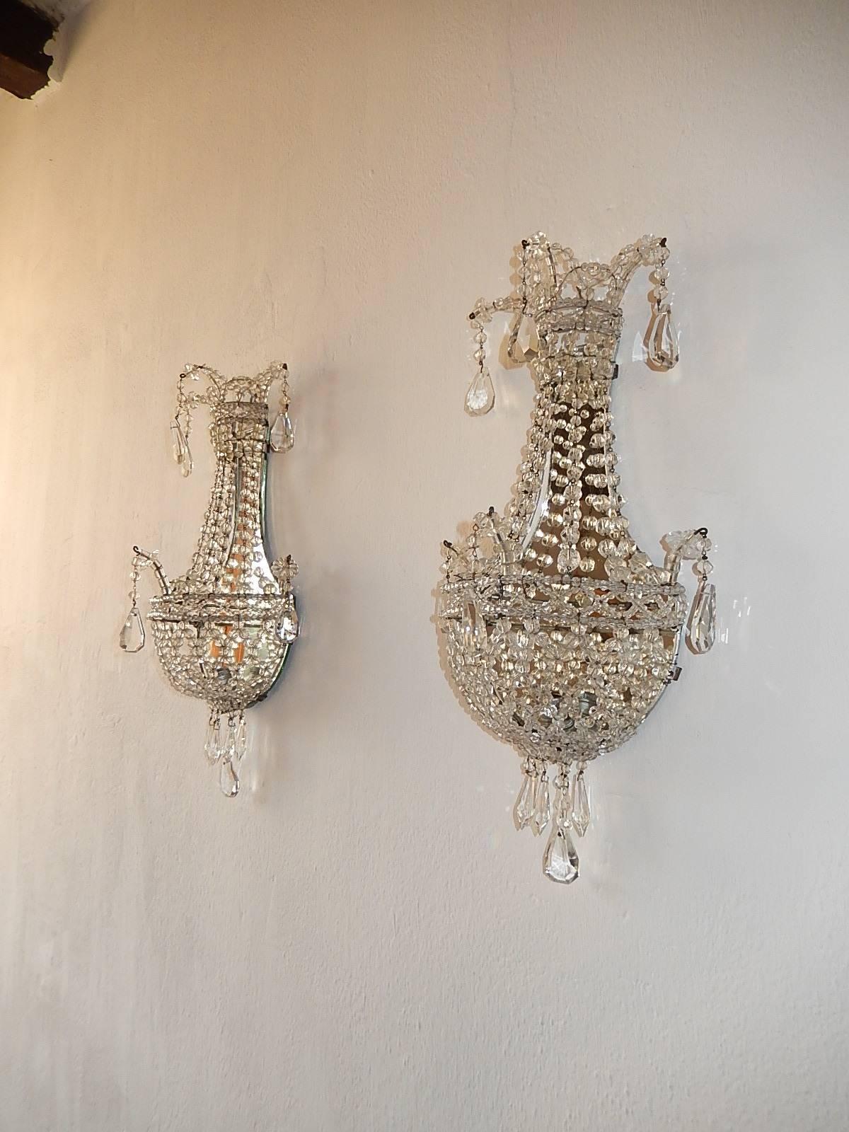 Housing one light each. Rewired and ready to hang. Completely beaded in crystal balls. Adorning crystal prisms. Mirrors on back in great shape. Free priority shipping from Italy.