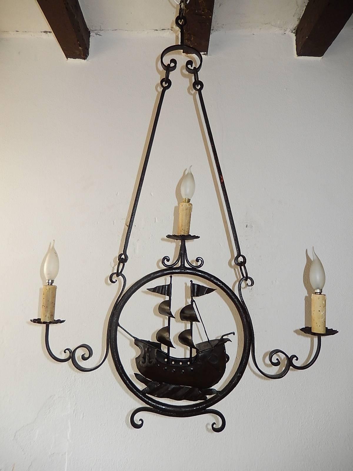 Housing 3 lights.  Handmade ship with sails, water and even an anchor.  Re-wired and ready to hang.  Free priority shipping from Italy.