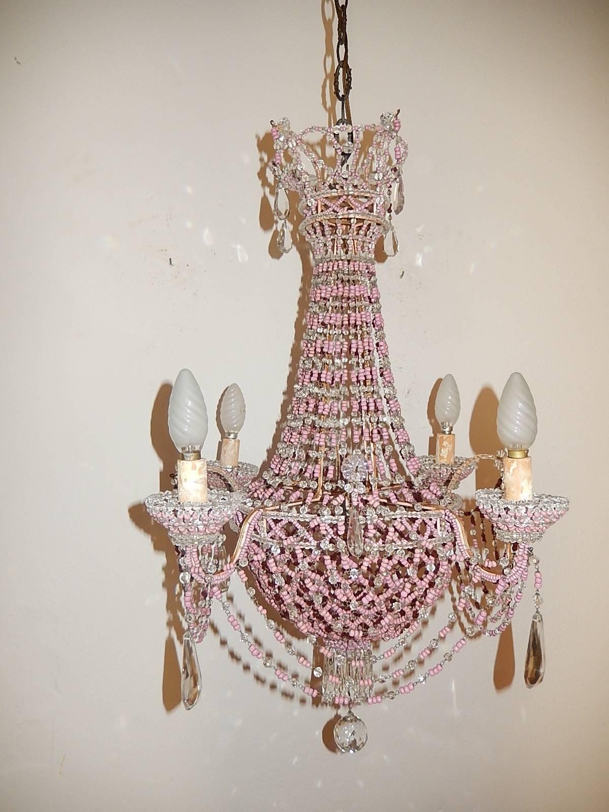 Housing five lights, four outside in beaded bobeches and one in center. Hand beaded and tied. Rare pink opaline beads, crystal beads and prisms. Beaded basket on bottom. Re-wired and ready to hang. Free priority shipping from Italy. Adding another