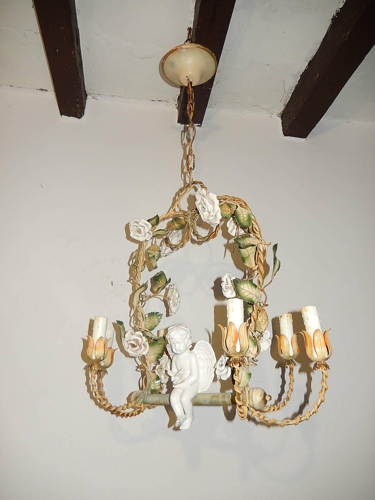 Housing 6 lights. Handmade porcelain roses on original tole. Winged cherub is 7.5 inches tall. Original chain and canopy adds 16 inches. Re-wired and ready to hang. Free priority shipping from Italy.