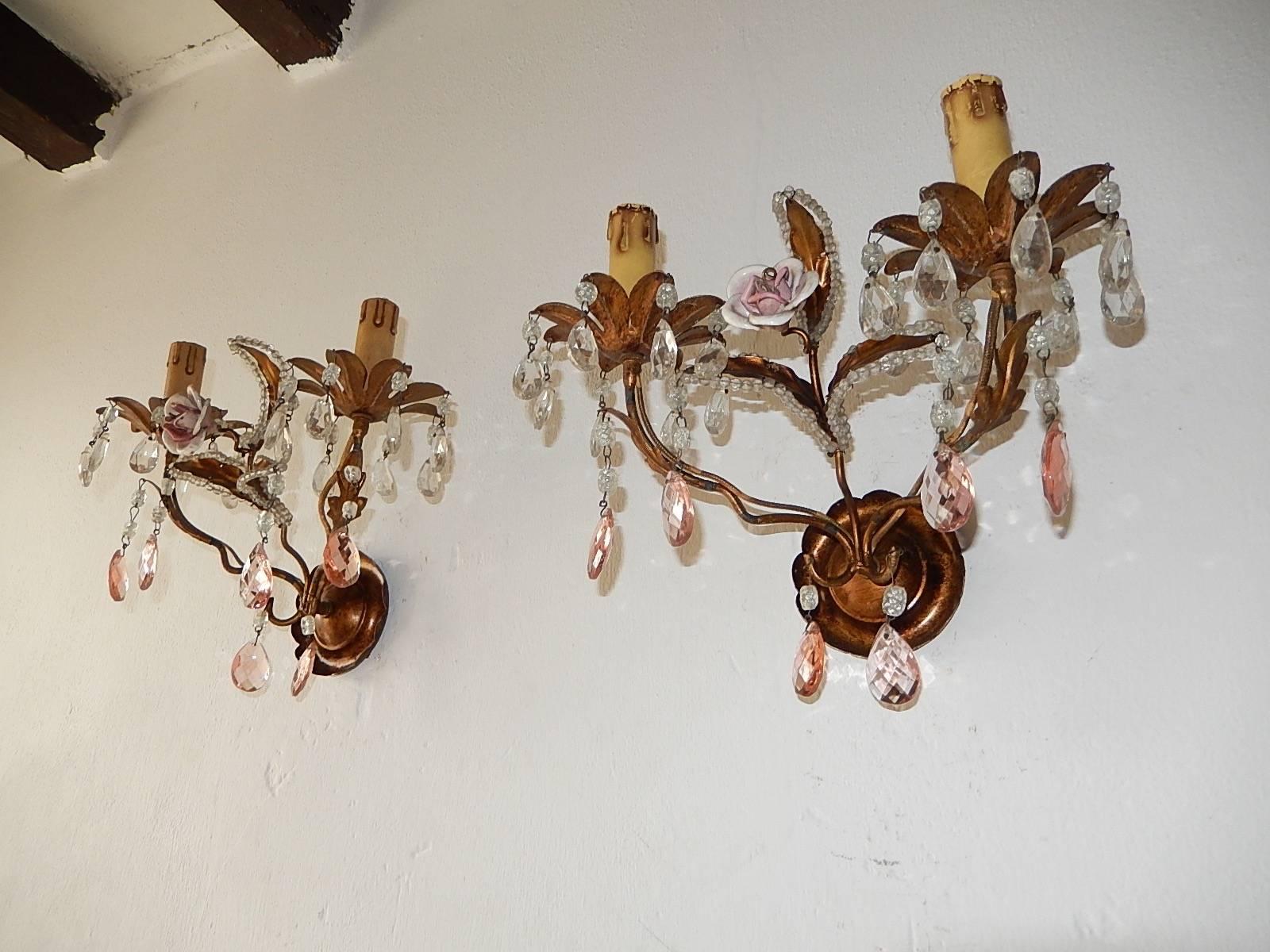 Matching chandelier is available as well. Housing two lights each. Tole with beads, prisms and pink porcelain roses. Re-wired and ready to hang. Free priority shipping from Italy.