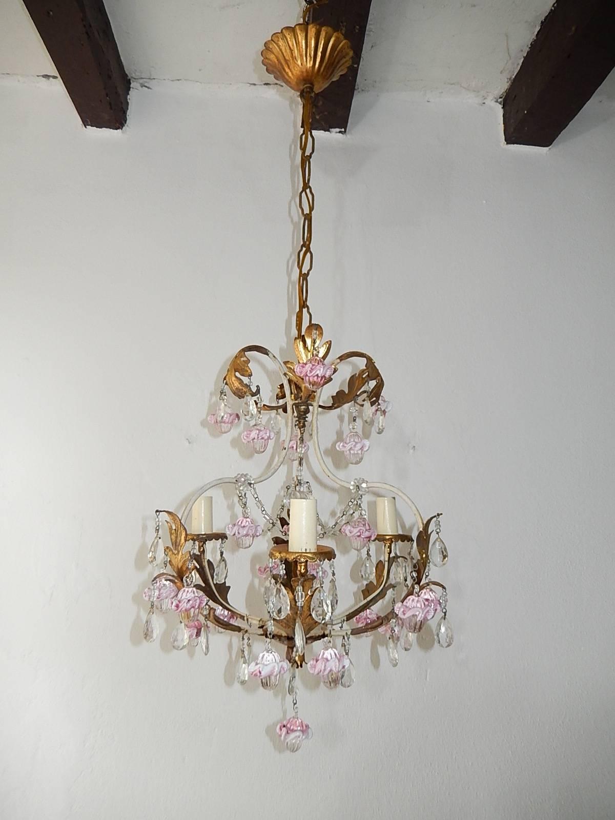 Housing three lights, re-wired and ready to hang! Gilt metal tole body dripping with rare pink ribbon Murano balls. Swags of crystal macaroni beads as well. Adding another 18 inches of original chain and canopy. Free priority shipping from Italy.