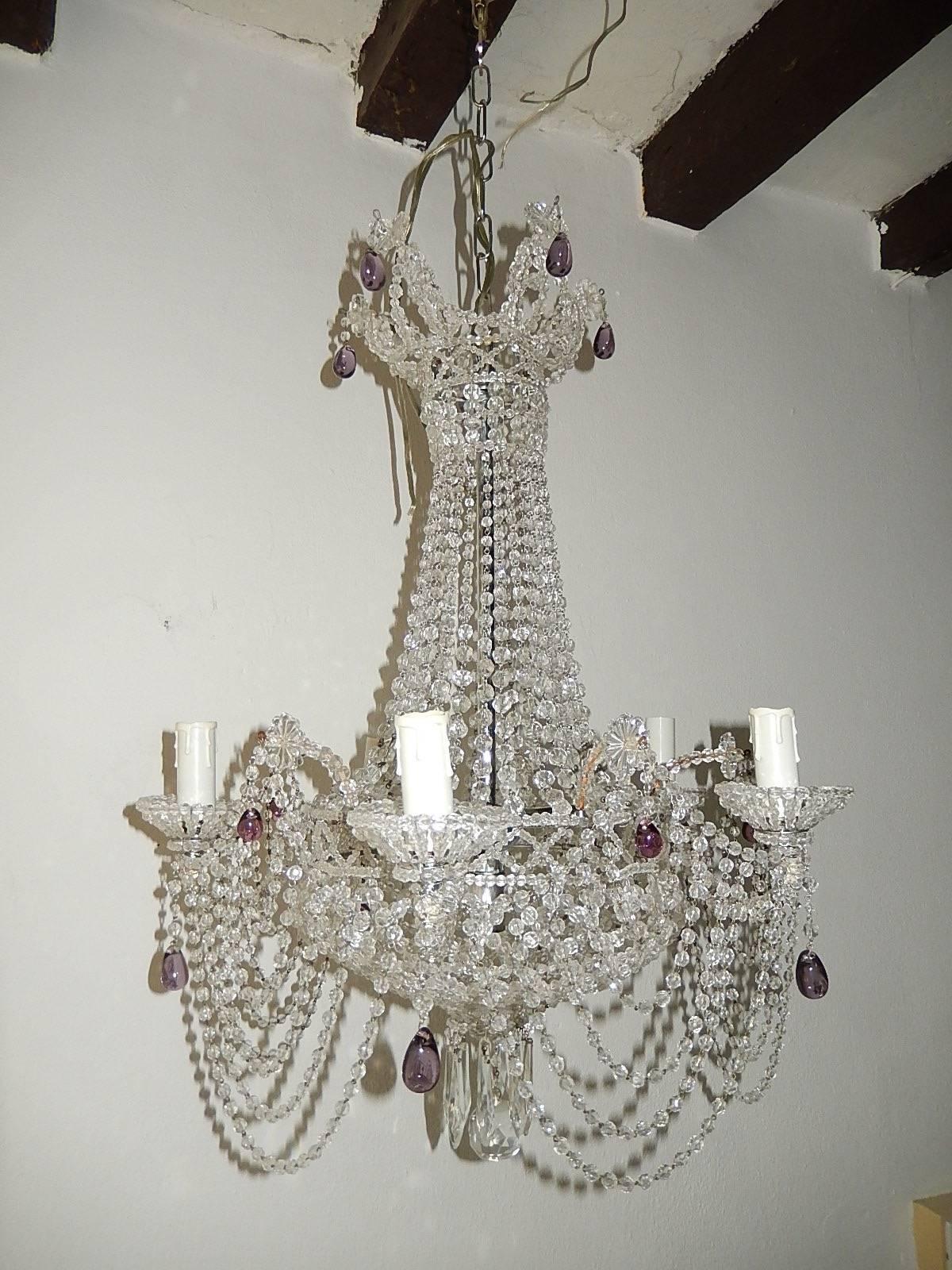 Housing six lights, five encircling in beaded cups and one in center. Completely beaded with a beaded lace bottom. Adorning amethyst drops on top and in center. Adding another 12 inches of original chain and canopy. Rewired and ready to hang. Free