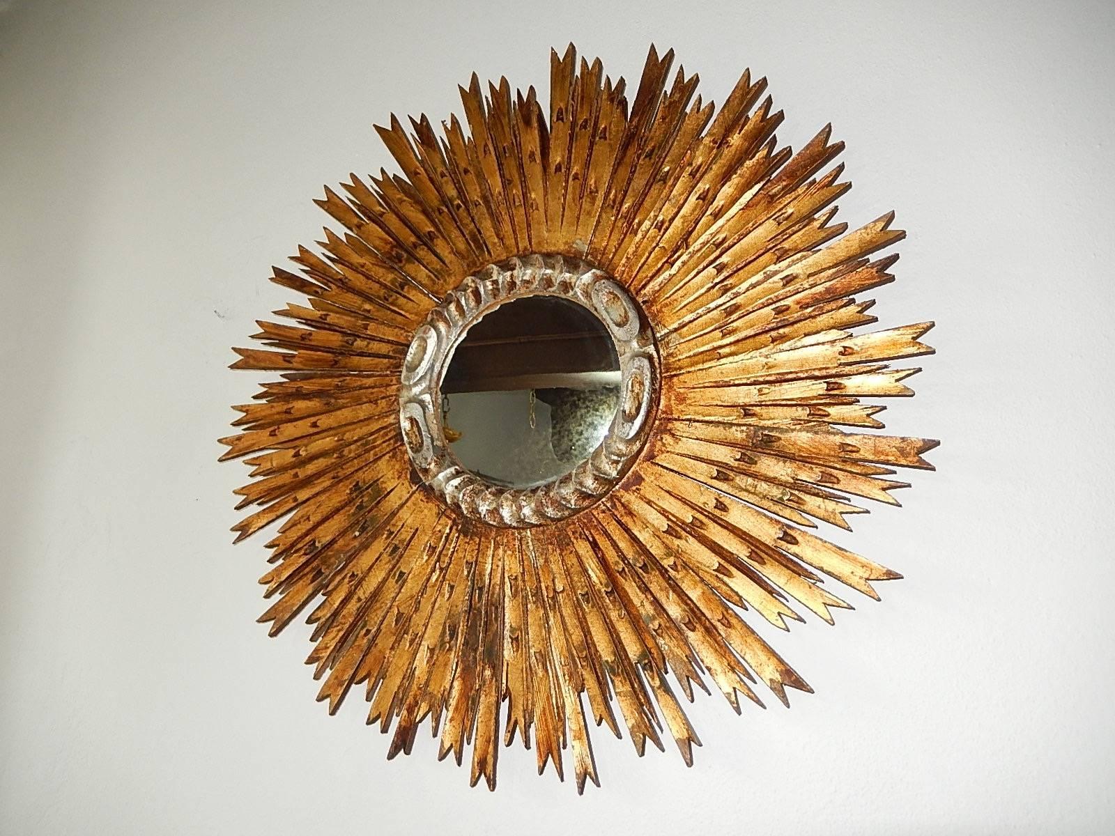 Beautiful gold gilt rays and silvered center. Center mirror measures 7.5 inches. Complete measures 27 inches. Free priority shipping from Italy.