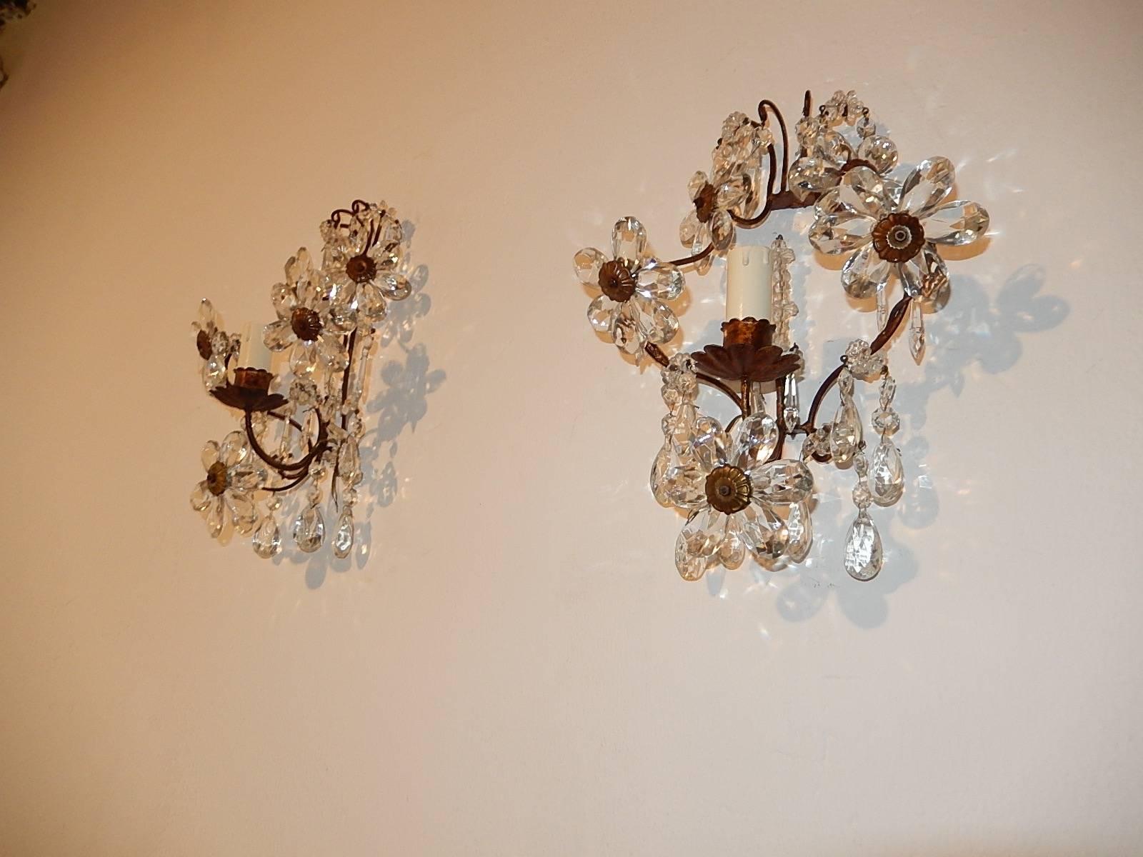 Housing one light each.  Rewired and ready to hang. Adoring crystal prism flowers in clear with wonderful vintage crystal prisms throughout. Free priority shipping from Italy.
