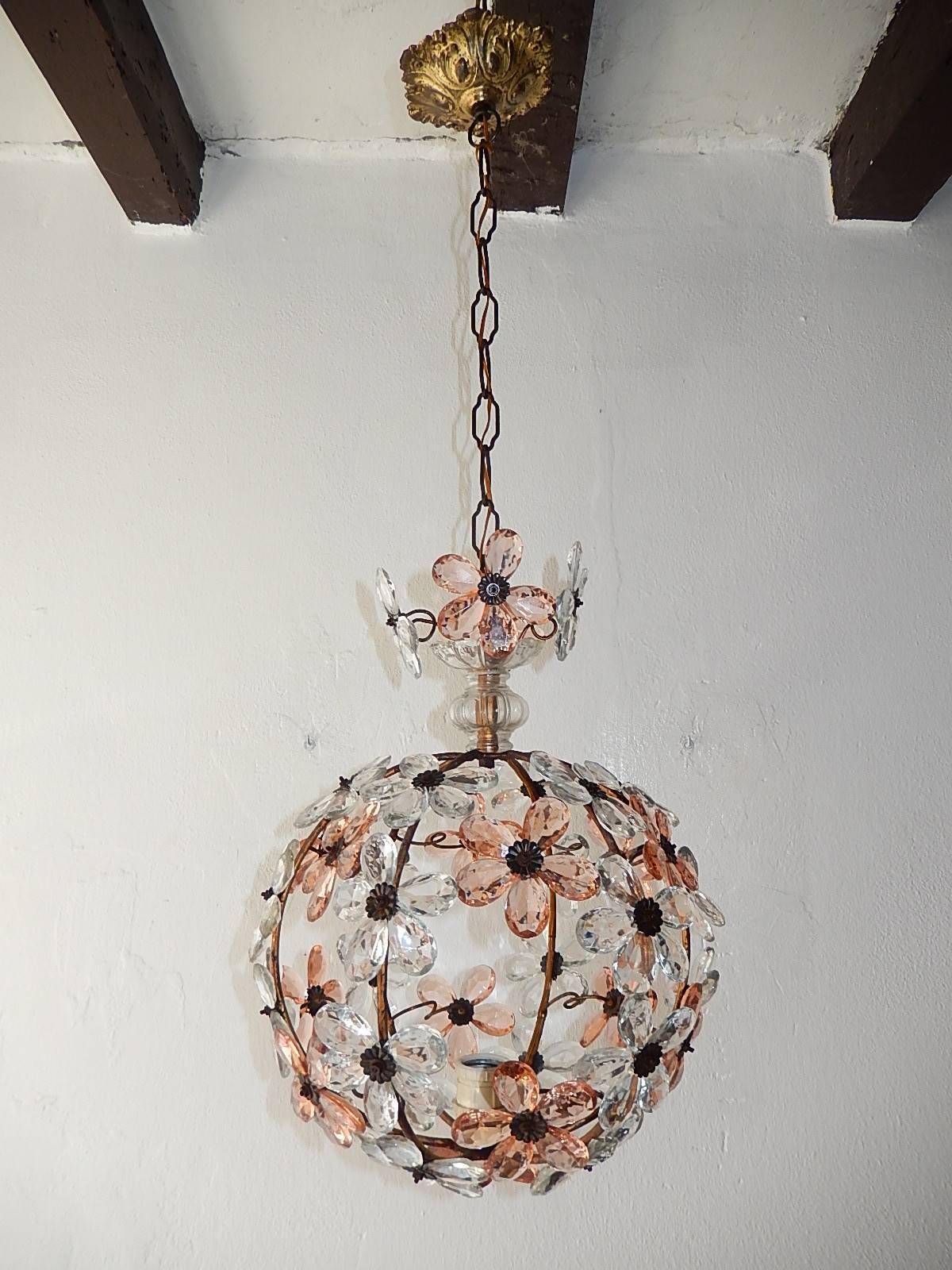 Housing one light. Rewired and ready to hang. Clear pink/light peach crystal prisms. (Not amber, some pictures look darker using flash) Murano glass and crystal bobèches on top. Adding another 13 inches of original chain and canopy. Free priority