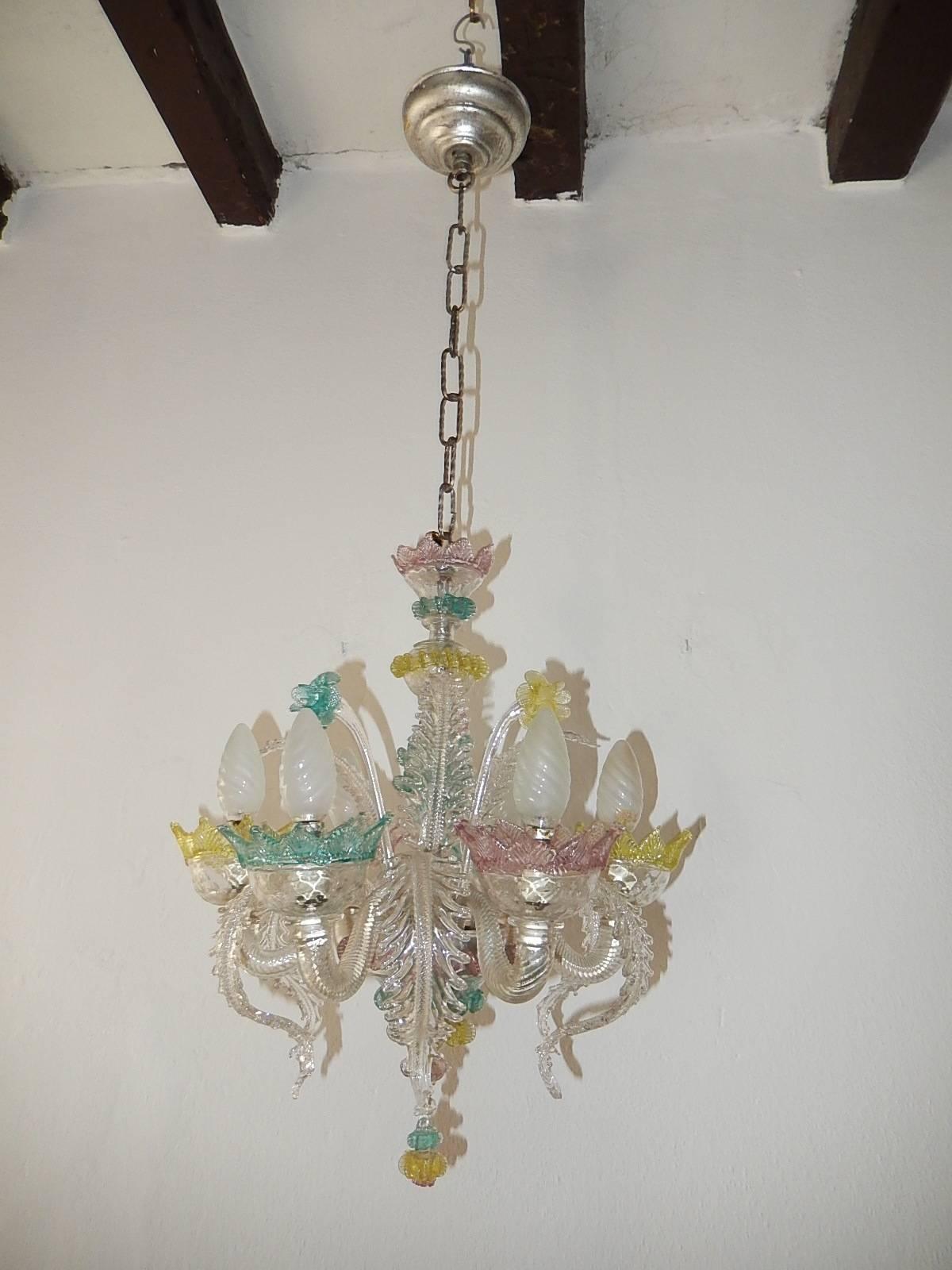 Housing six-lights, rewired and ready to hang. Pastel pink, yellow and blue blown Murano glass. Blue flower has a chip and also the bottom of lamp, the pink ribbon has chipping. Adding another 17 inches of original chain and canopy. Free priority